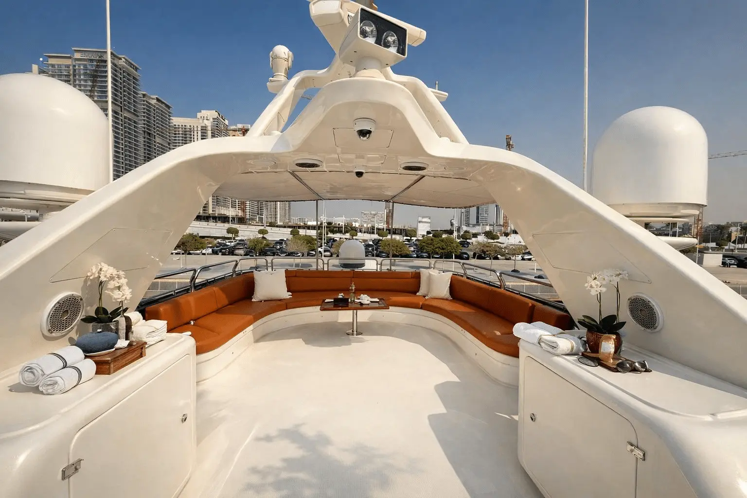 Benetti 120 sun deck lounge with curved seating and open sky design