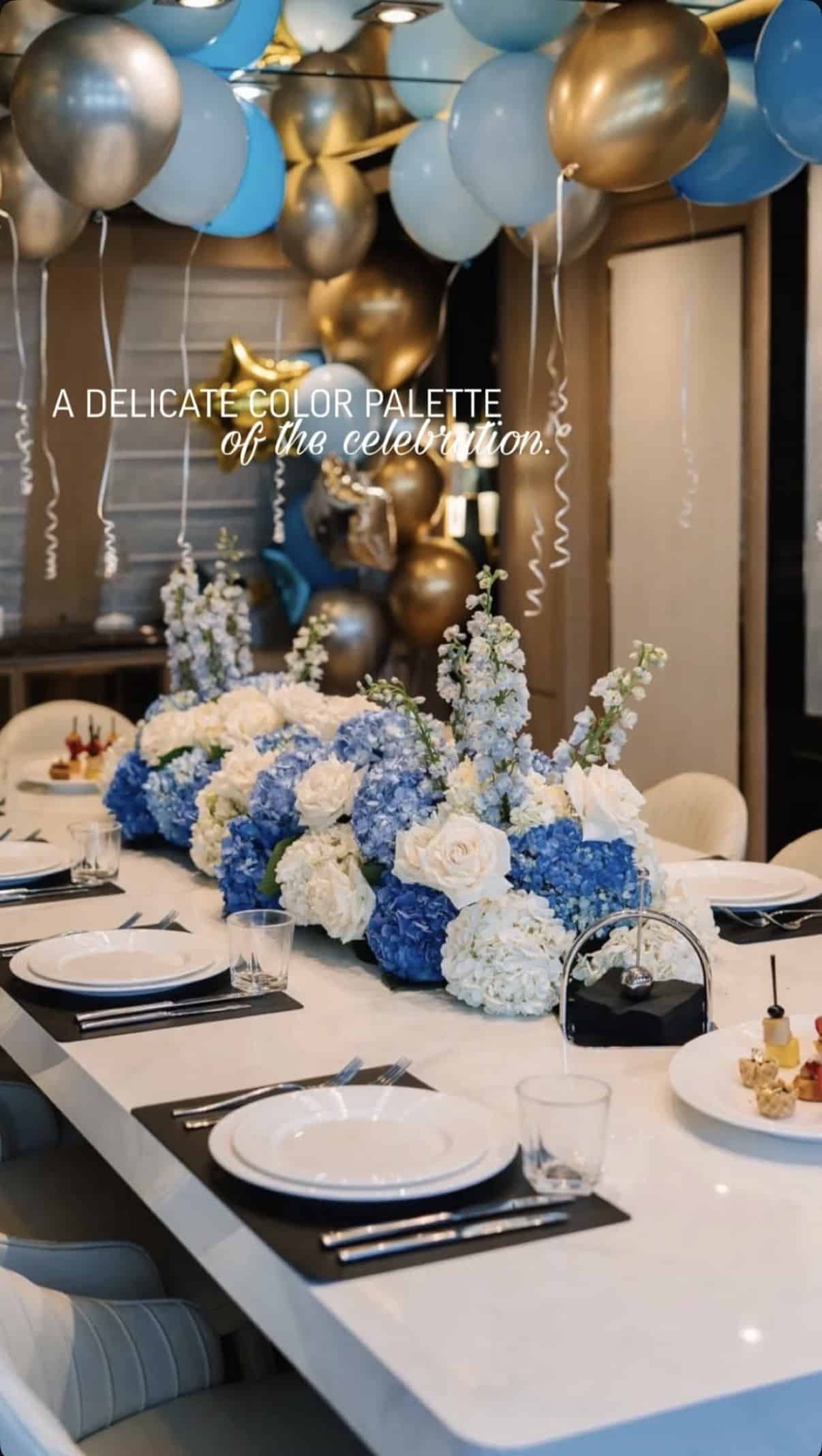 elegant luxury table setup for yacht event catering with decorative tableware