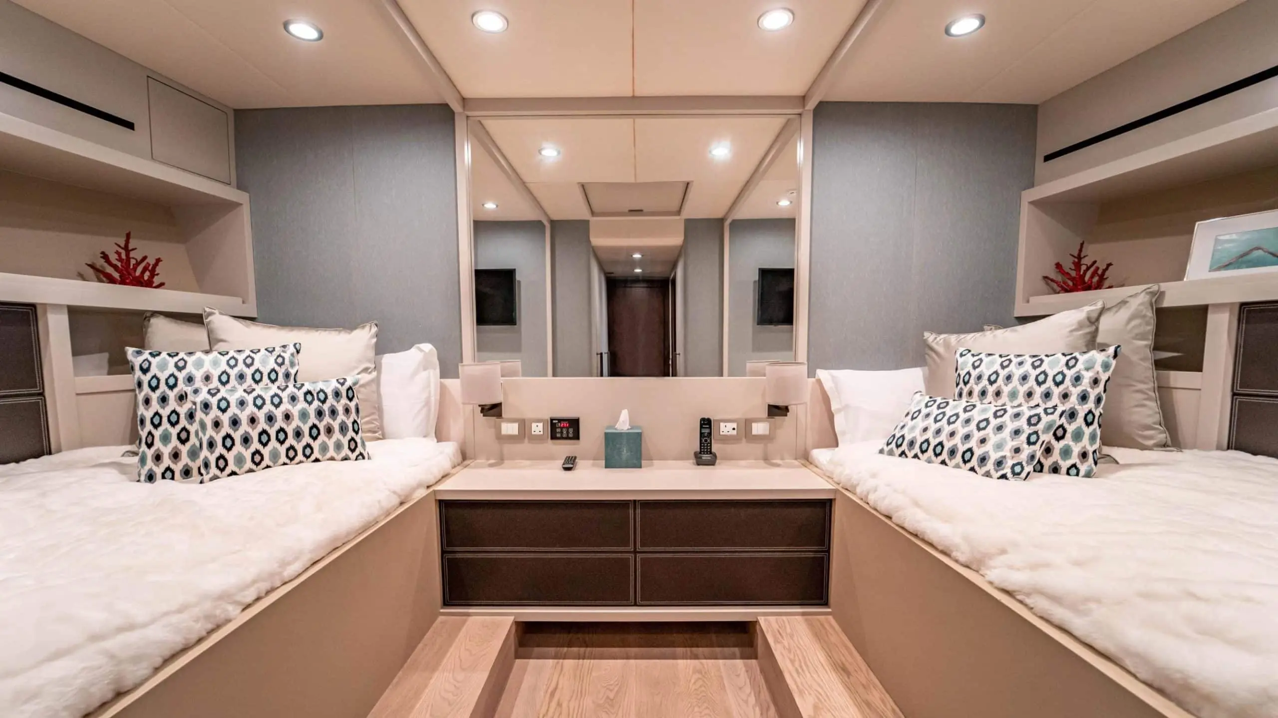 Dolce Vita yacht master cabin with queen bed, wooden finishes and modern luxury interior in Dubai