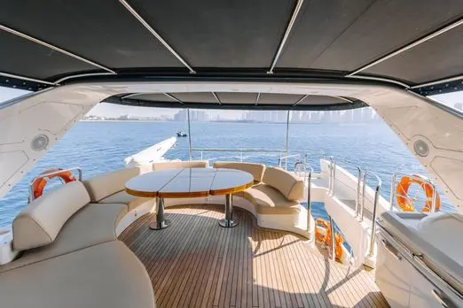 Outdoor dining area on Azimut 79 luxury yacht charter in Abu Dhabi marina