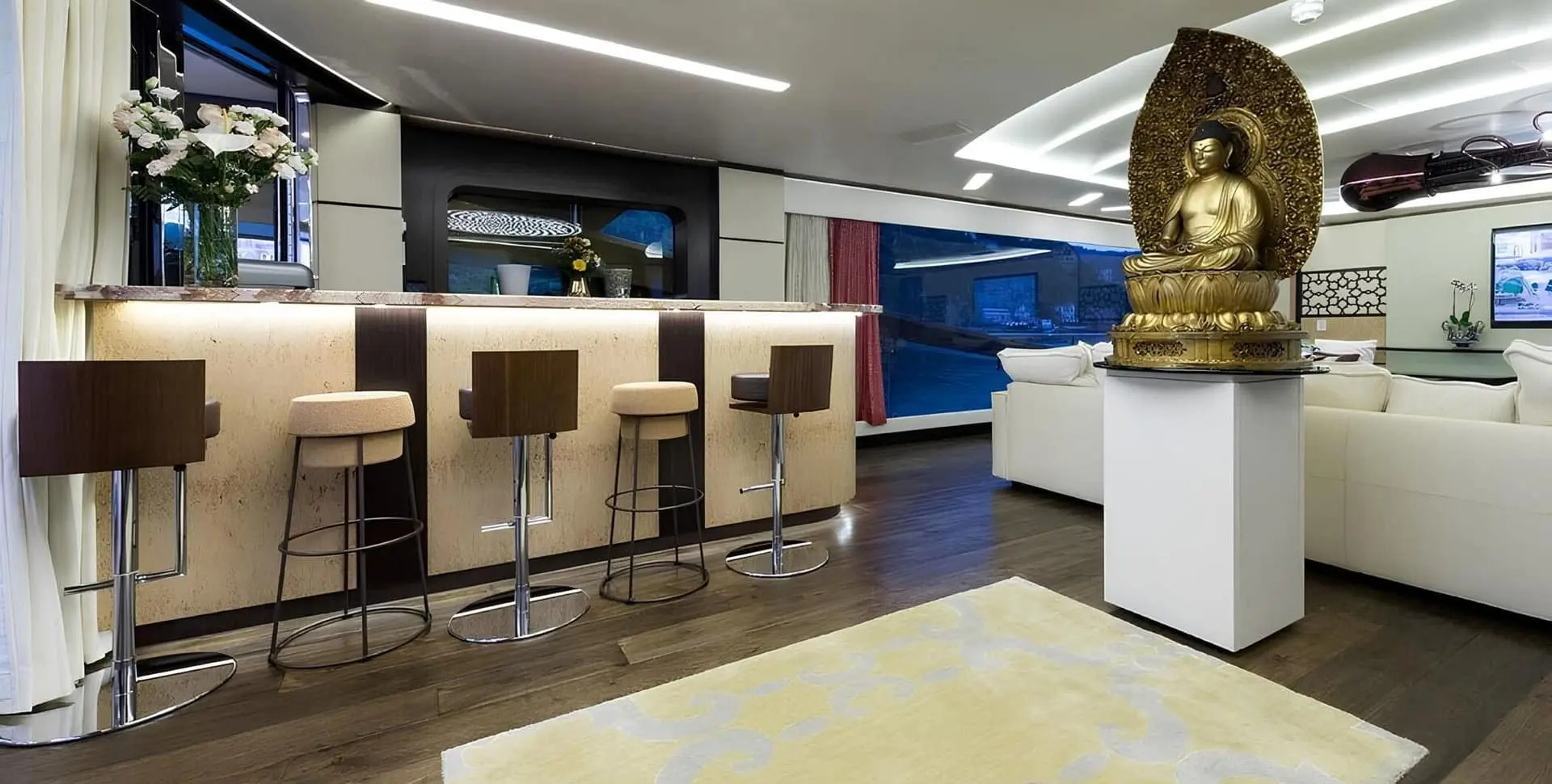 SuperSport 48 sky lounge bar with stools and ambient lighting
