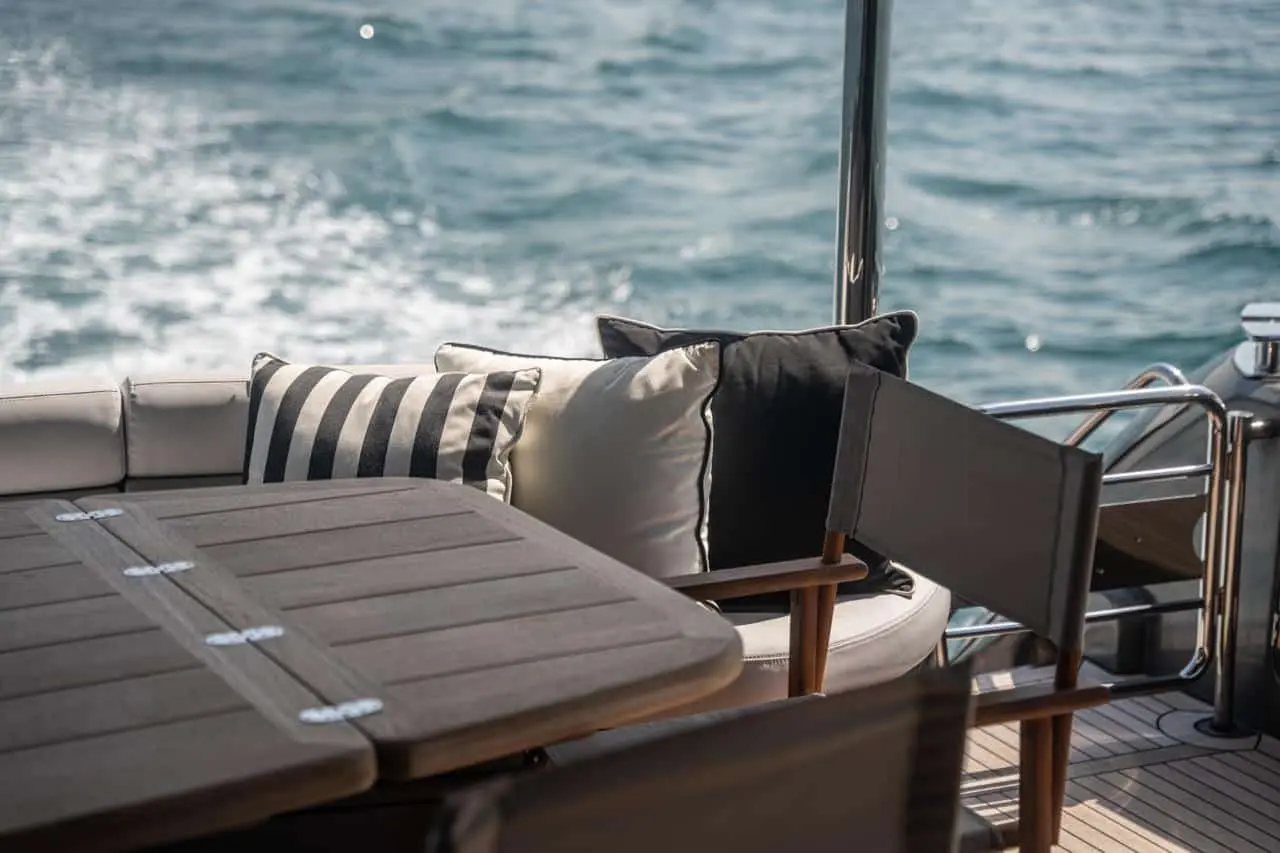 Sunseeker 82 Yacht aft deck sunpad and dining table detail
