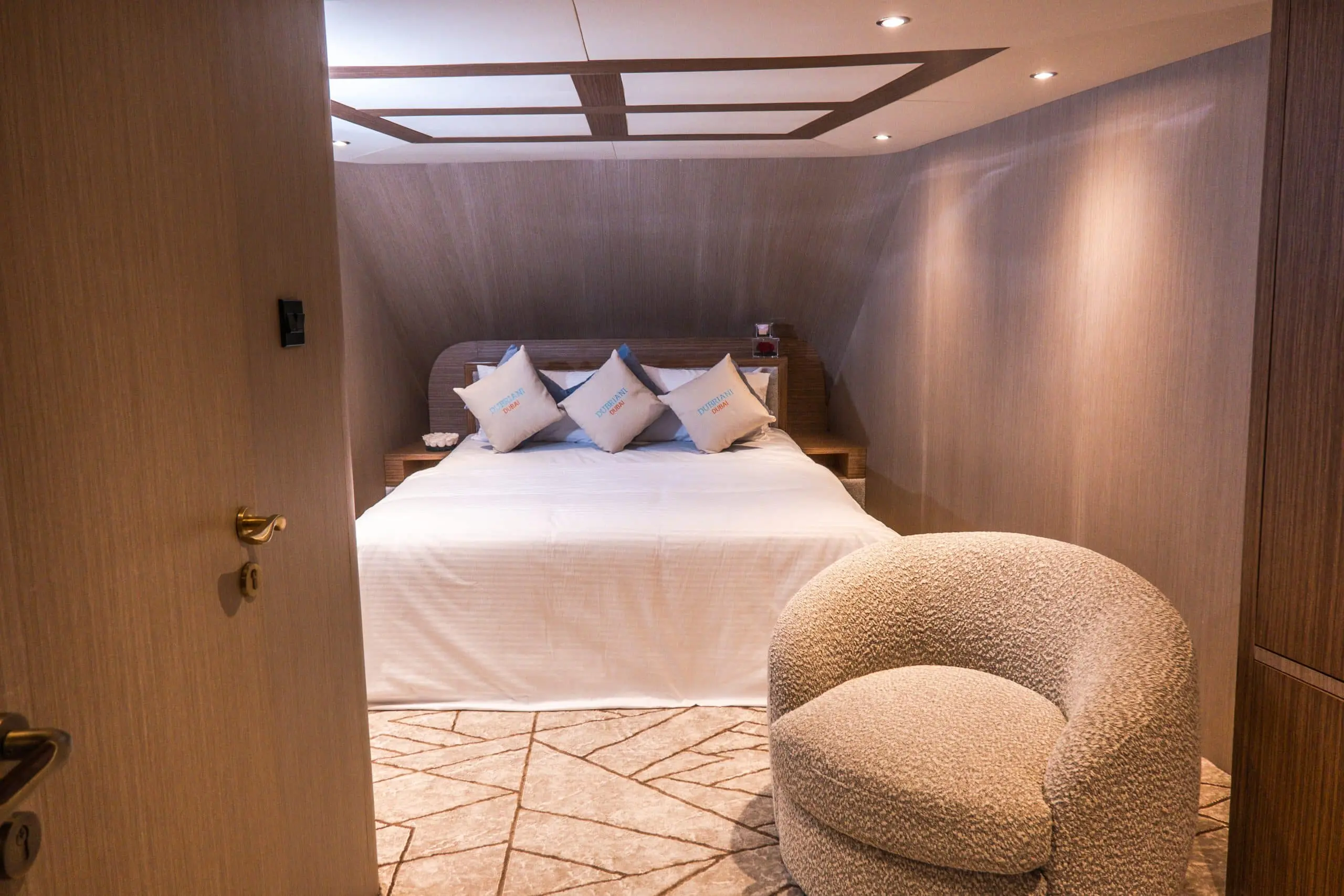 Luxurious yacht bedroom with soft lighting and modern décor