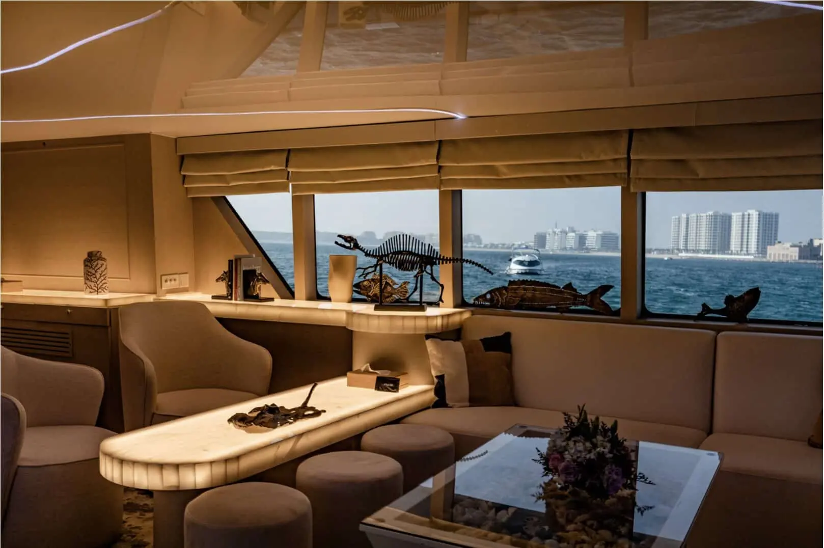 Finesse yacht foredeck seating area with panoramic skyline view