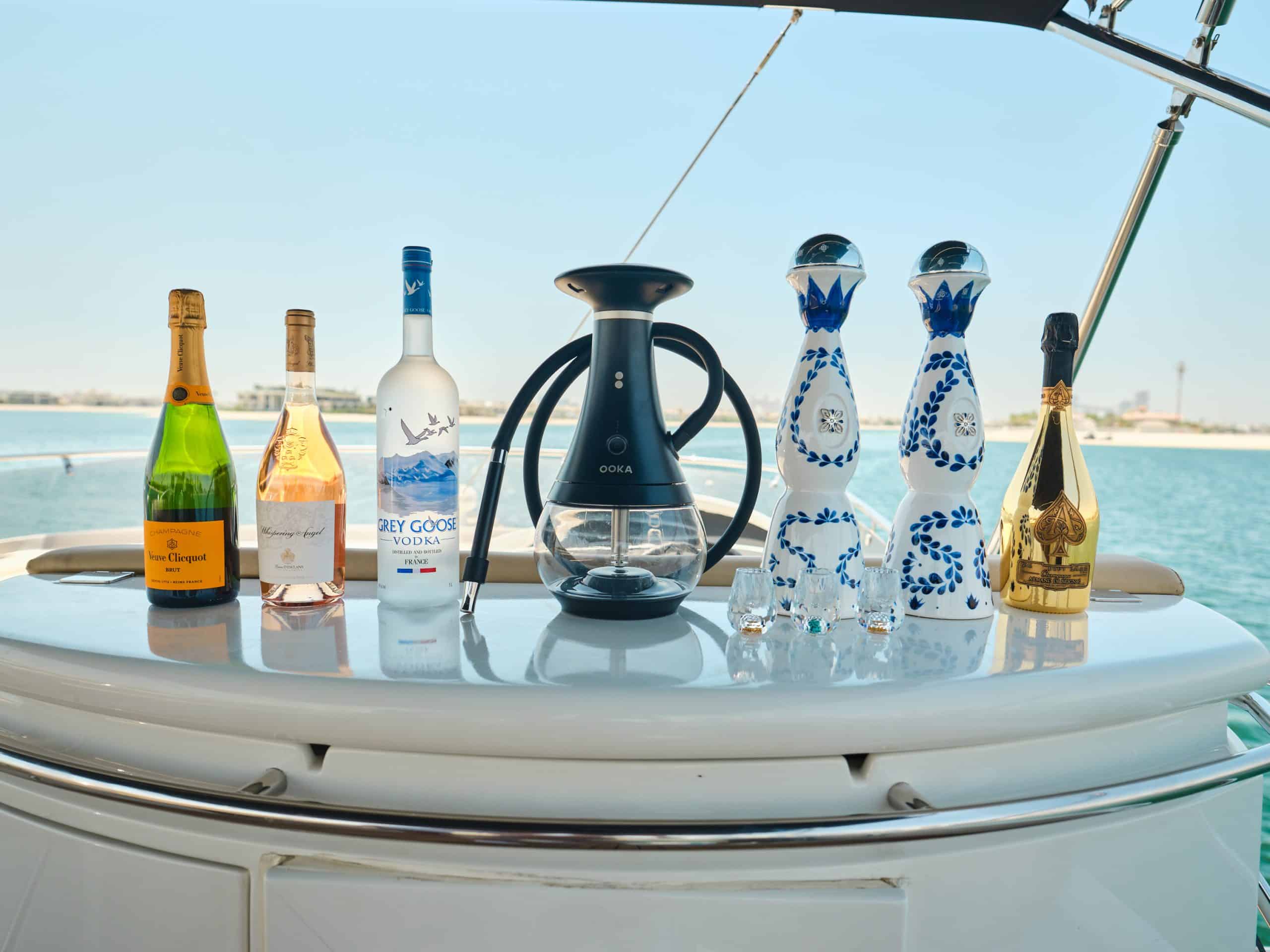 Luxury beverage display on Sunseeker Satoshi 70 yacht deck