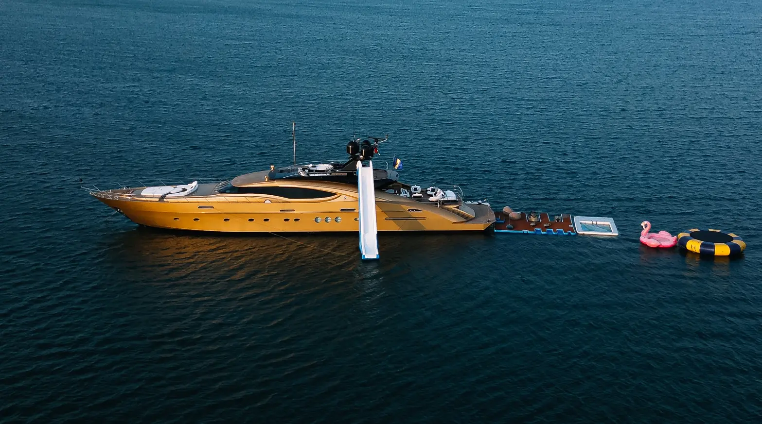 Royalty 136 luxury yacht with seabob water activity at sea