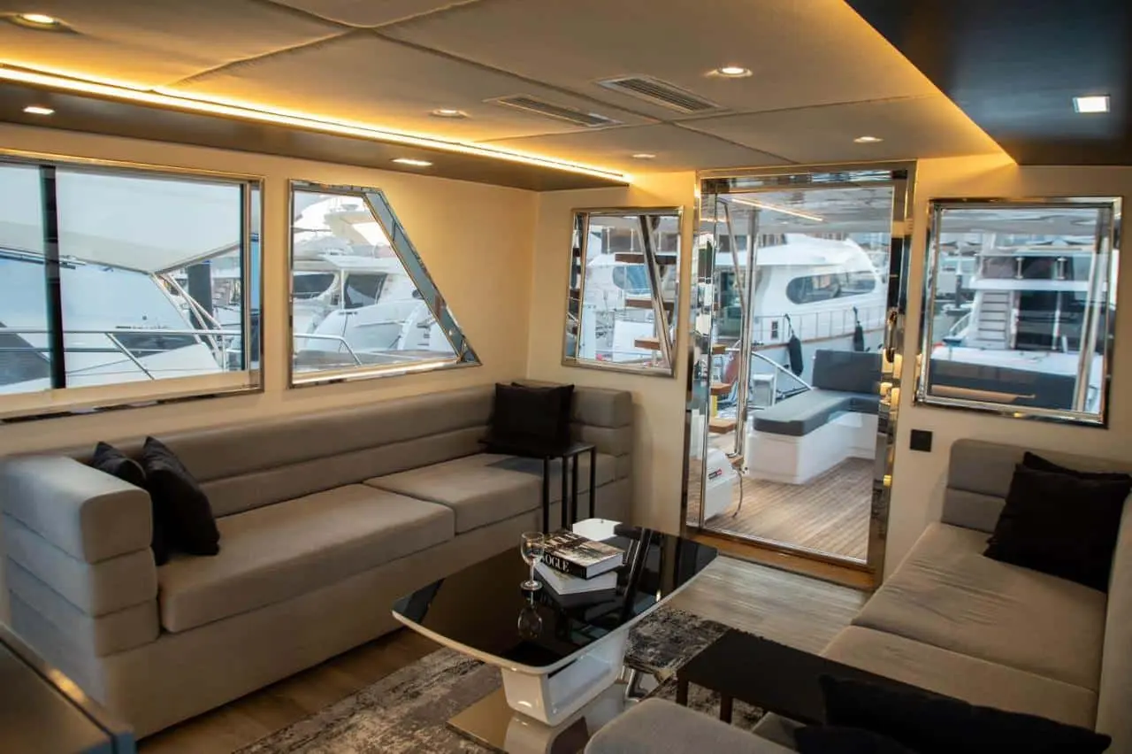 Modern salon seating area inside Zenith 64 luxury yacht