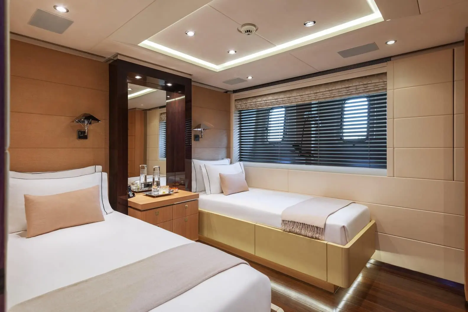 Heesen 5000 twin guest cabin with leather-panelled walls