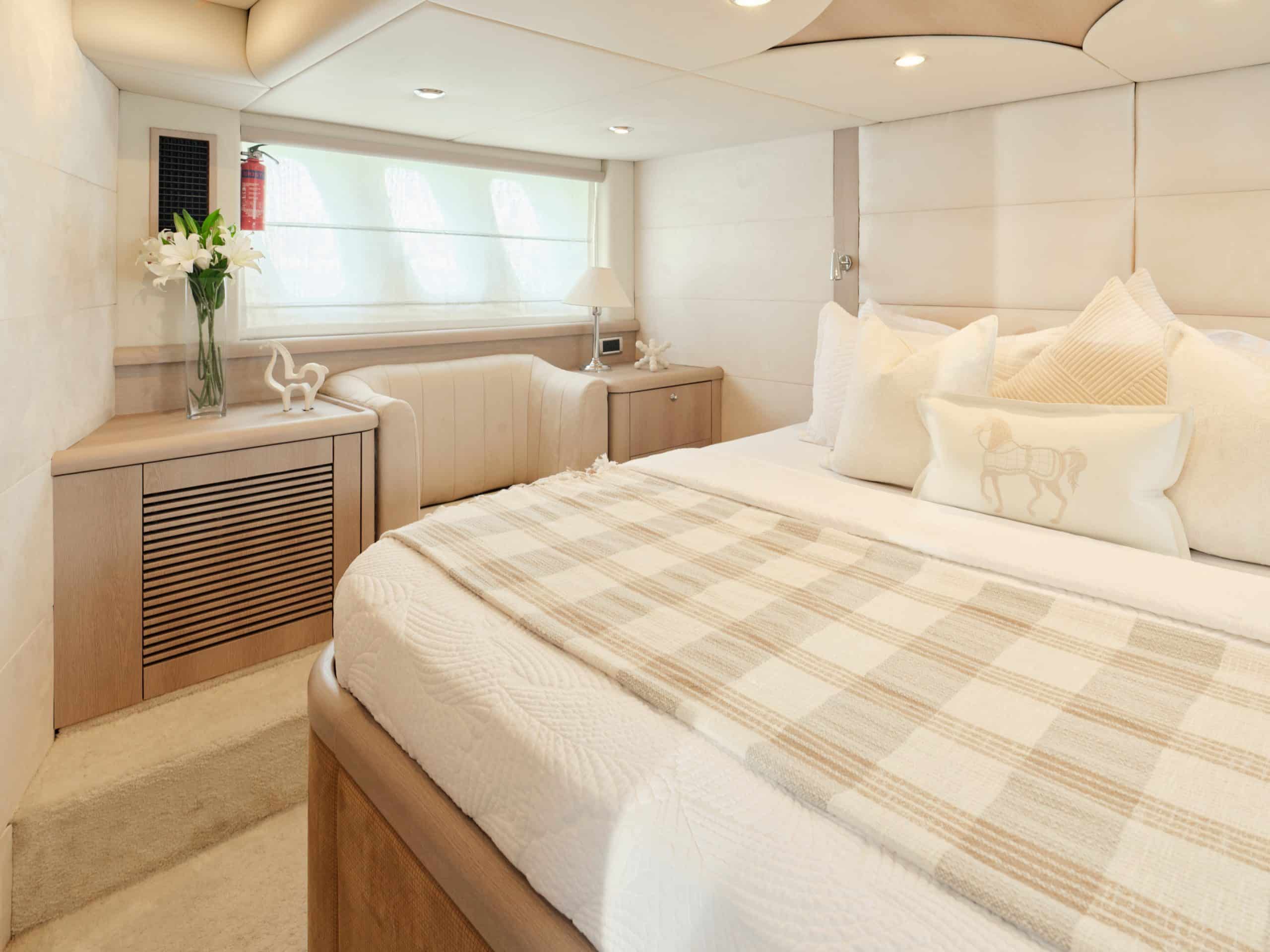 Sunseeker Satoshi 70 guest cabin with double bed and large side windows