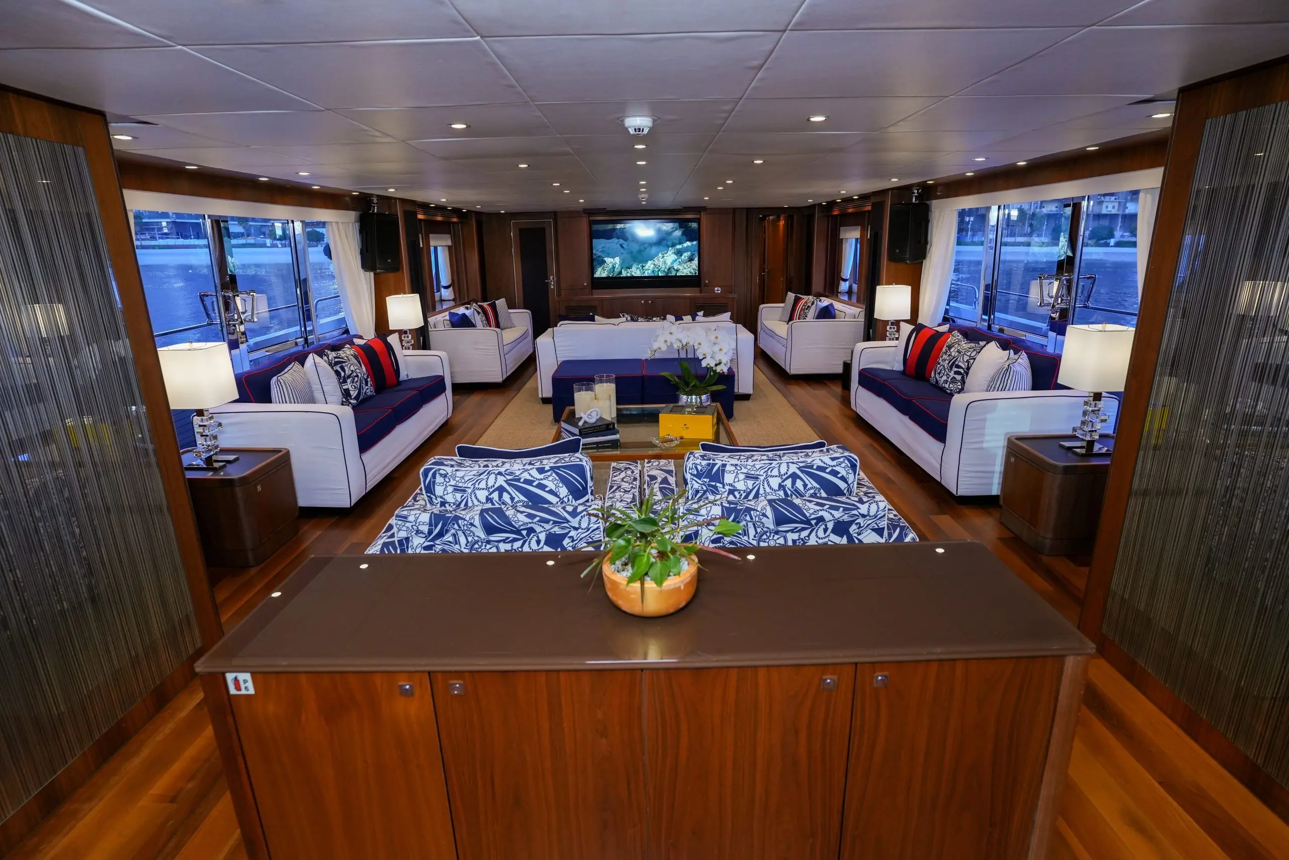 Luxury lounge seating area inside Sunseeker 131 superyacht with elegant décor