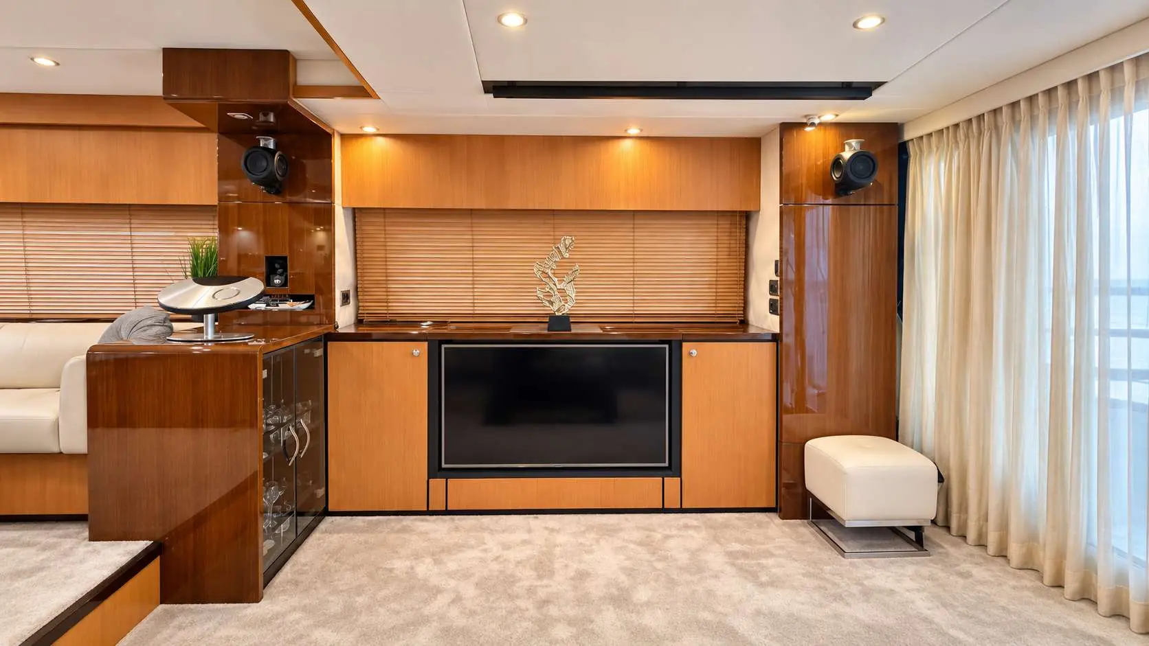 Empress 80 salon entertainment wall with TV and bar cabinet