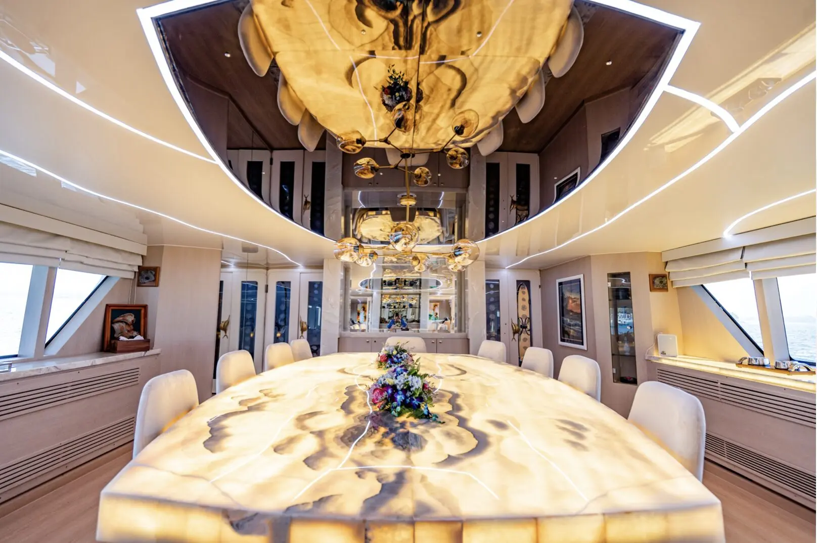 Formal dining area with chandelier inside Finesse superyacht Dubai