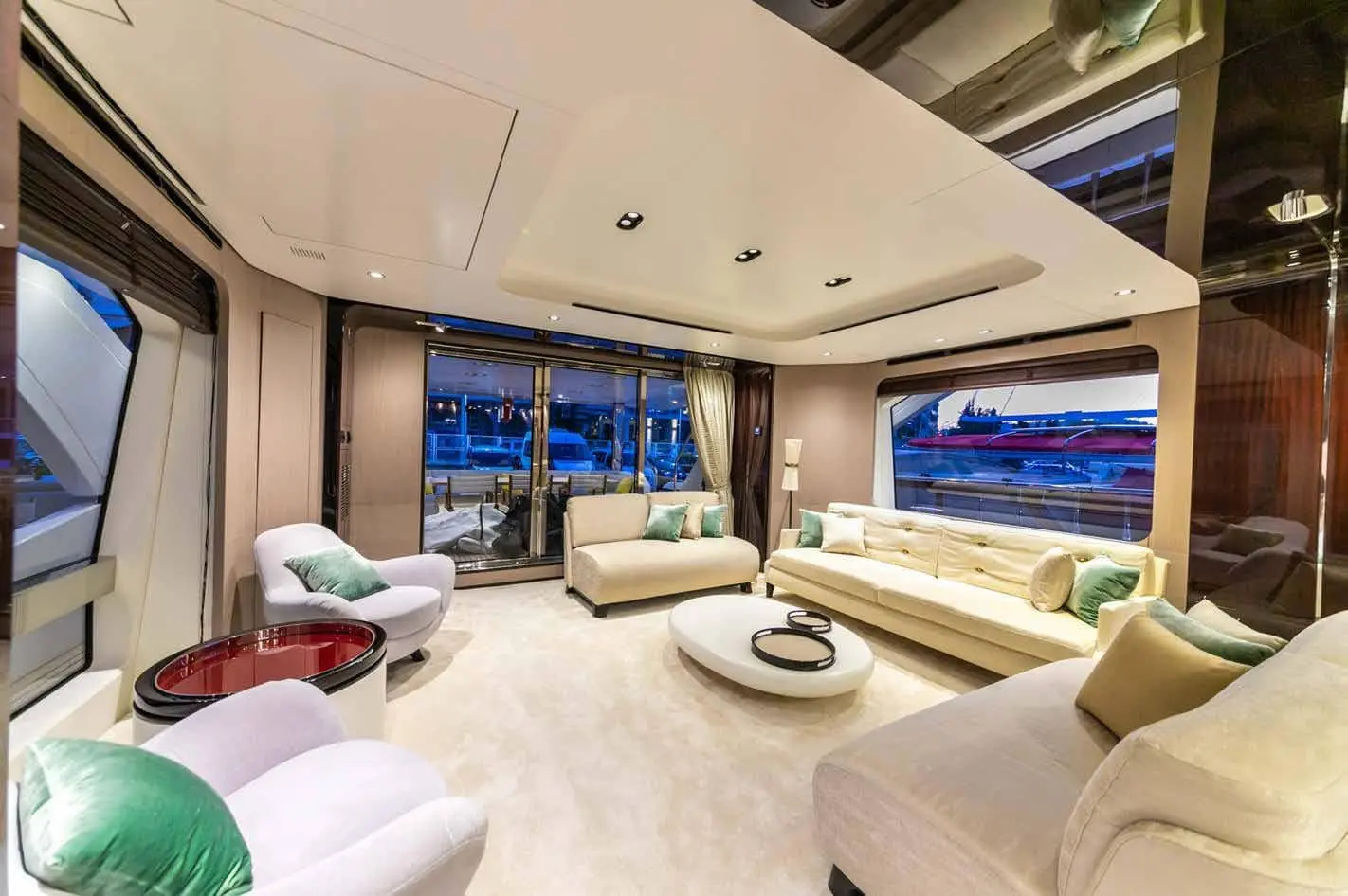 Azimut Grande 27M salon looking aft with panoramic windows, broker photo
