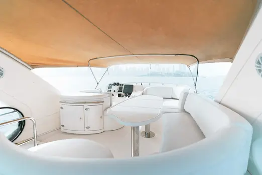 Outdoor lounge and helm station on Diana 50 yacht