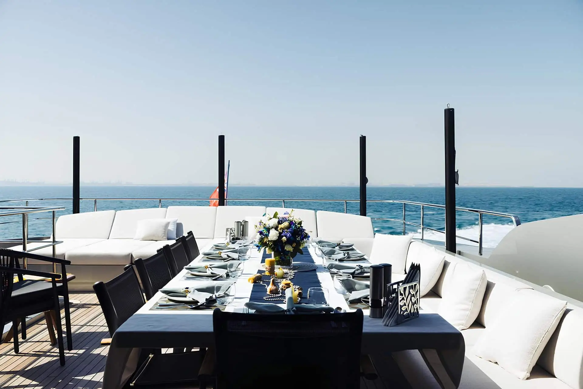Sanlorenzo 40 Alloy upper deck dining with open sea views