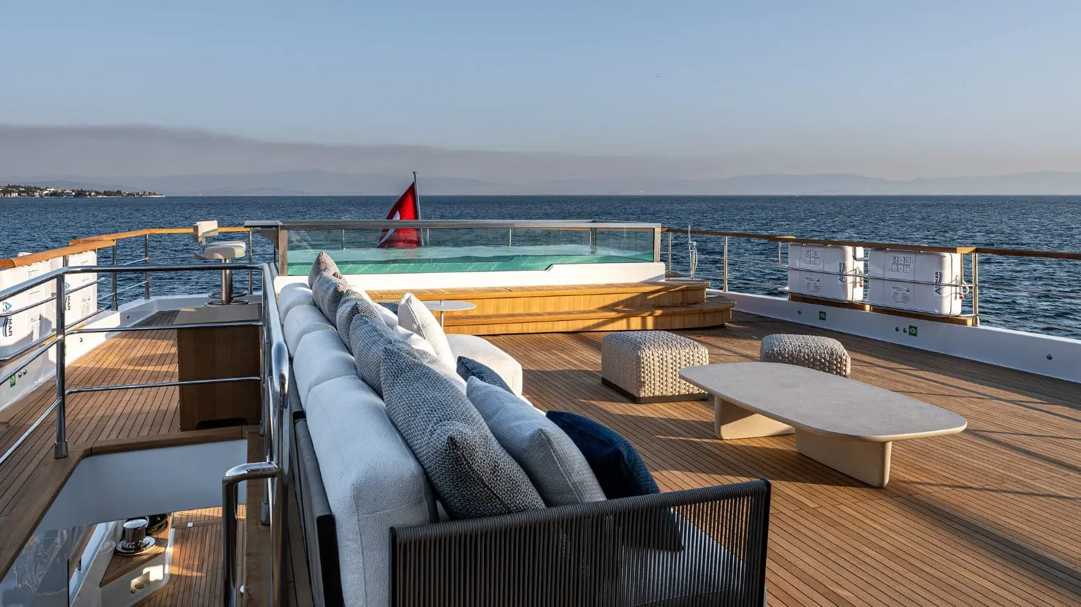 Numarine 40MXP aft deck sofas facing the pool — shipyard photo