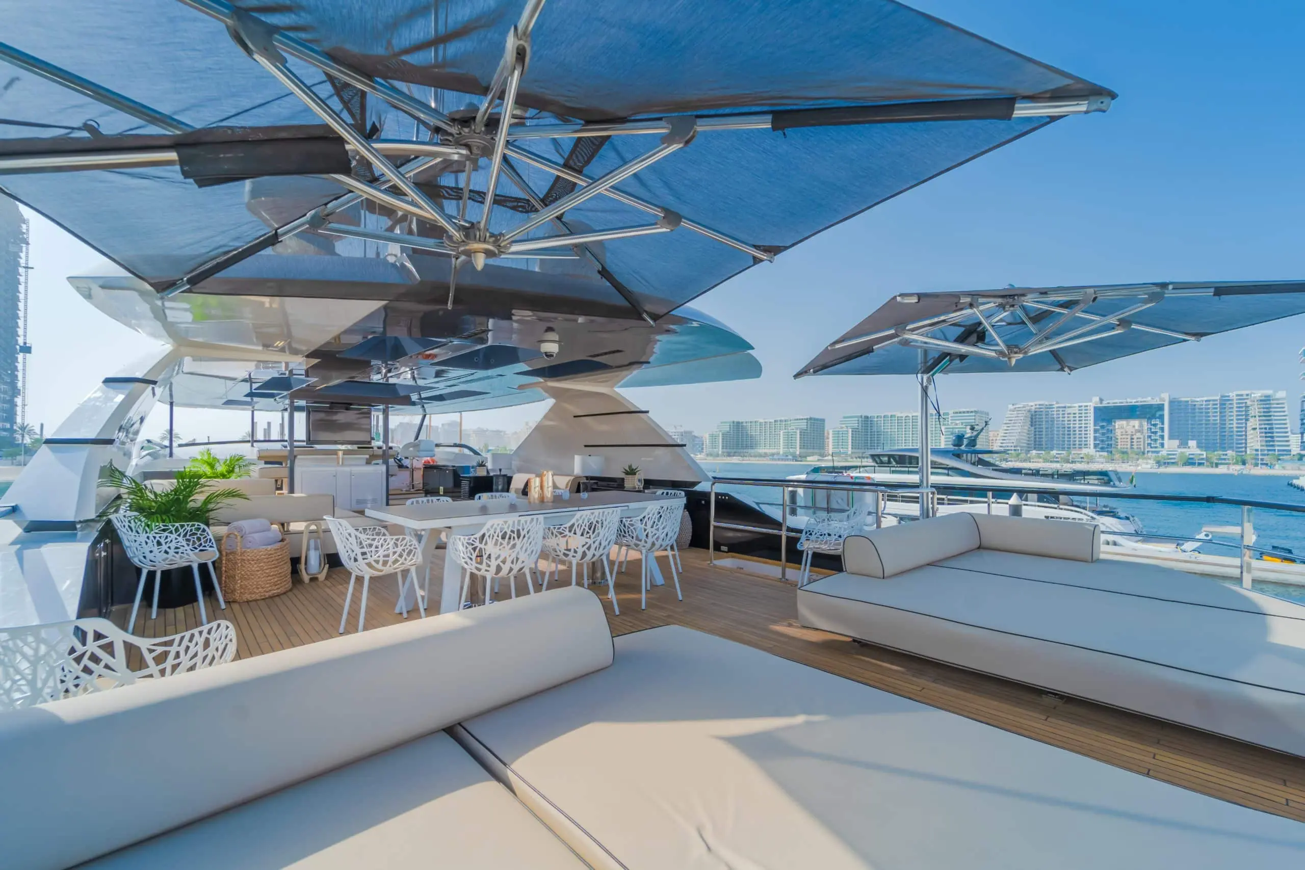 Saffuriya VIP yacht aft deck dining area with shaded seating, marina views and spacious outdoor layout