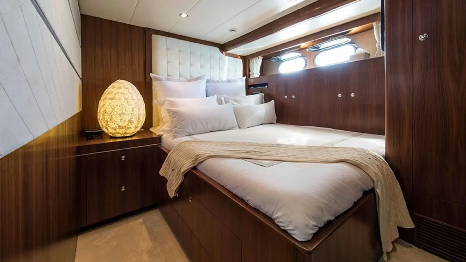 Zeta 100 yacht double guest cabin with elegant wood paneling