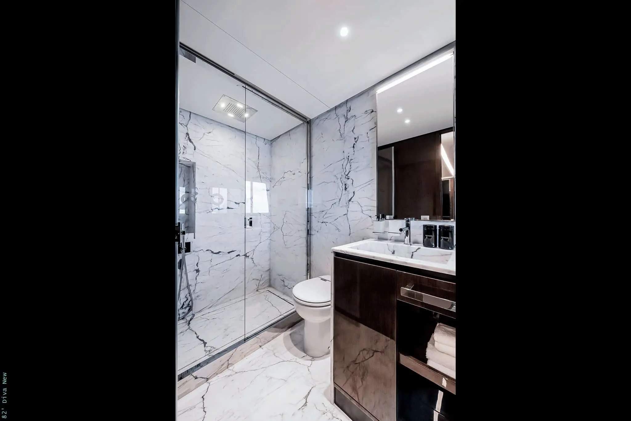 Riva 82 Diva ensuite bathroom with marble shower and dark vanity