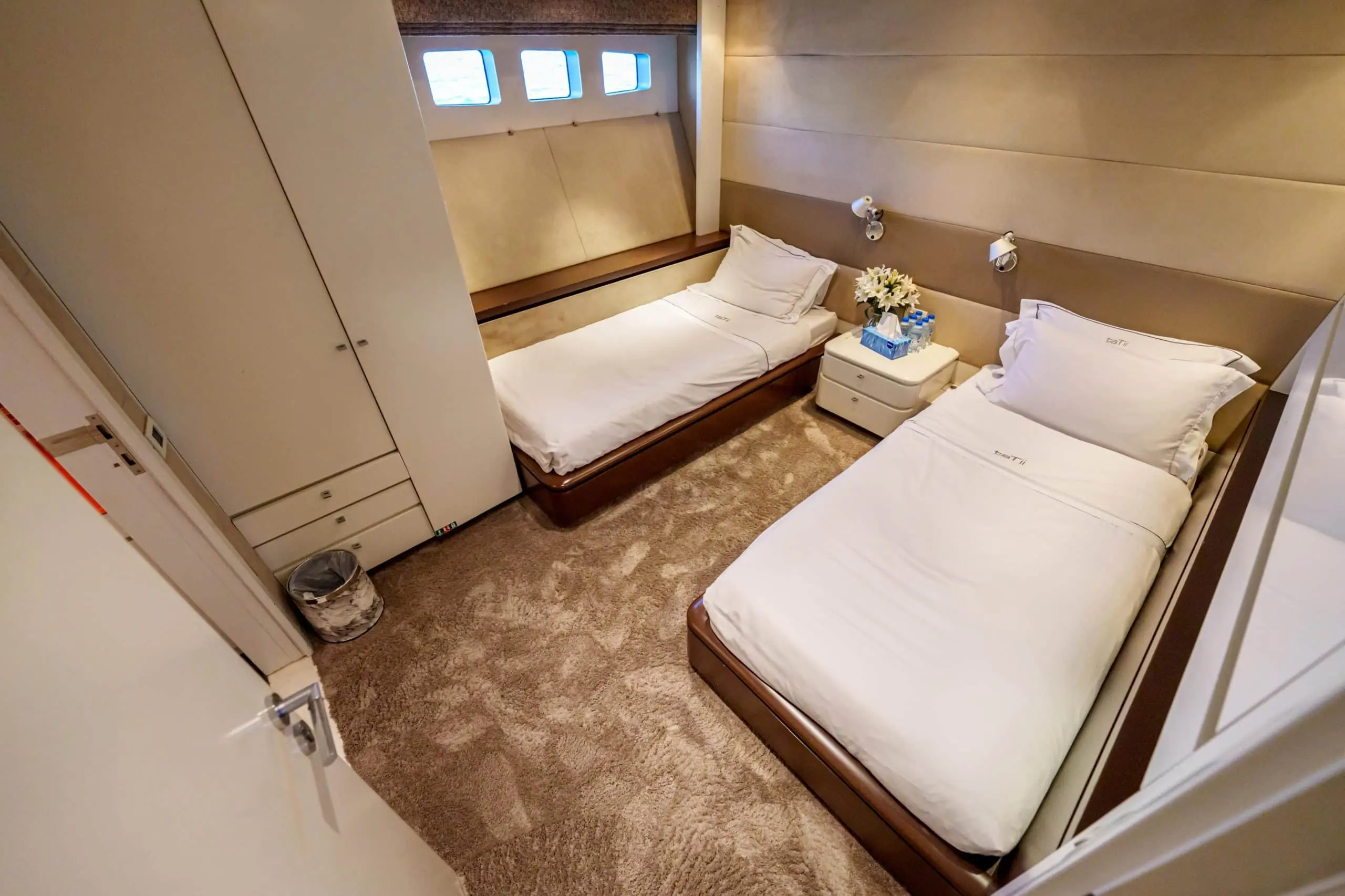 Twin guest cabin bedroom on Tatti 110 luxury yacht