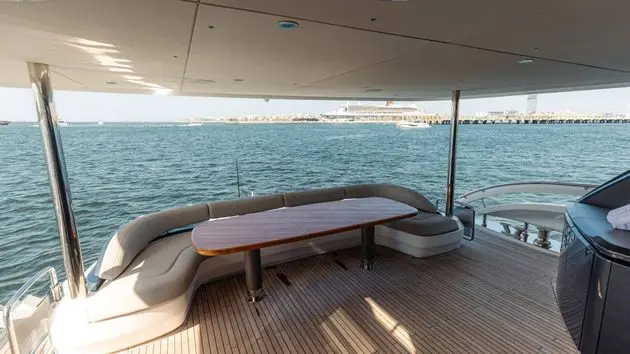 Princess X95 aft deck dining table over the water