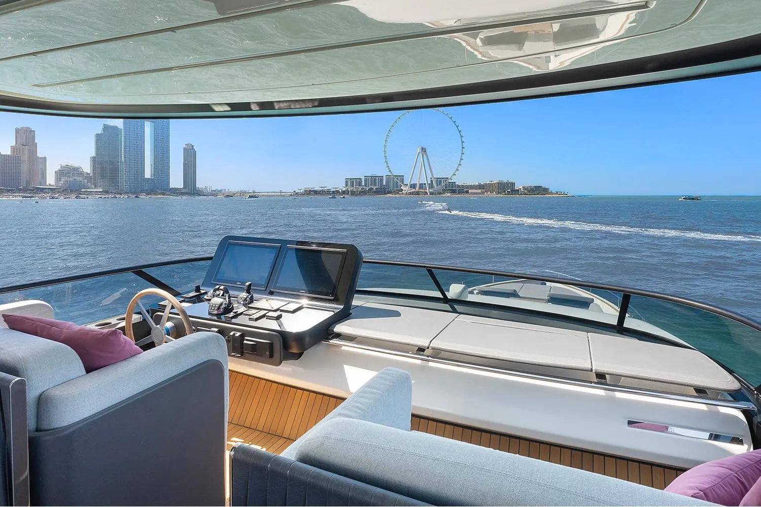 Cranchi Settantotto 78 flybridge helm with twin navigation screens