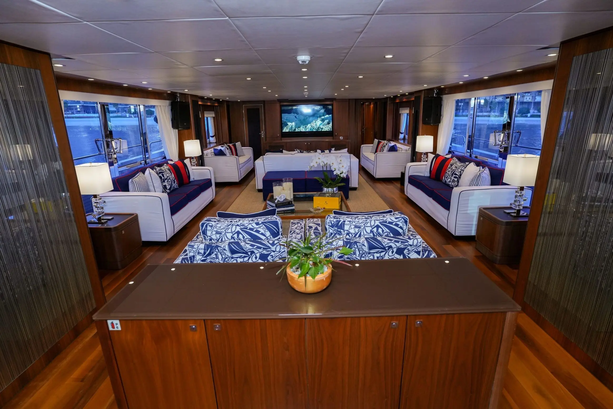 Luxury lounge seating area inside Sunseeker 131 superyacht with elegant décor