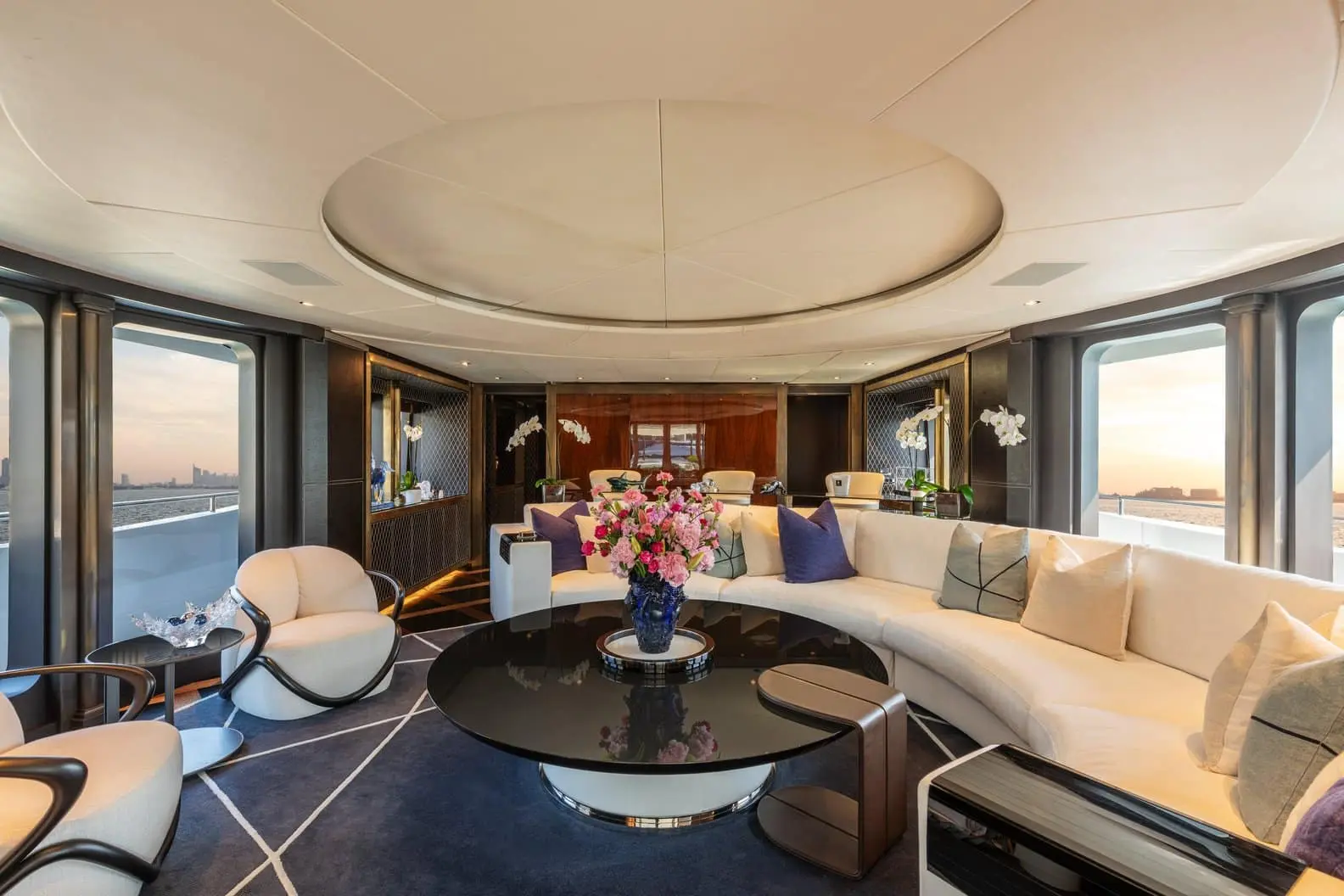 Heesen 5000 panoramic sky lounge with curved cream sofa