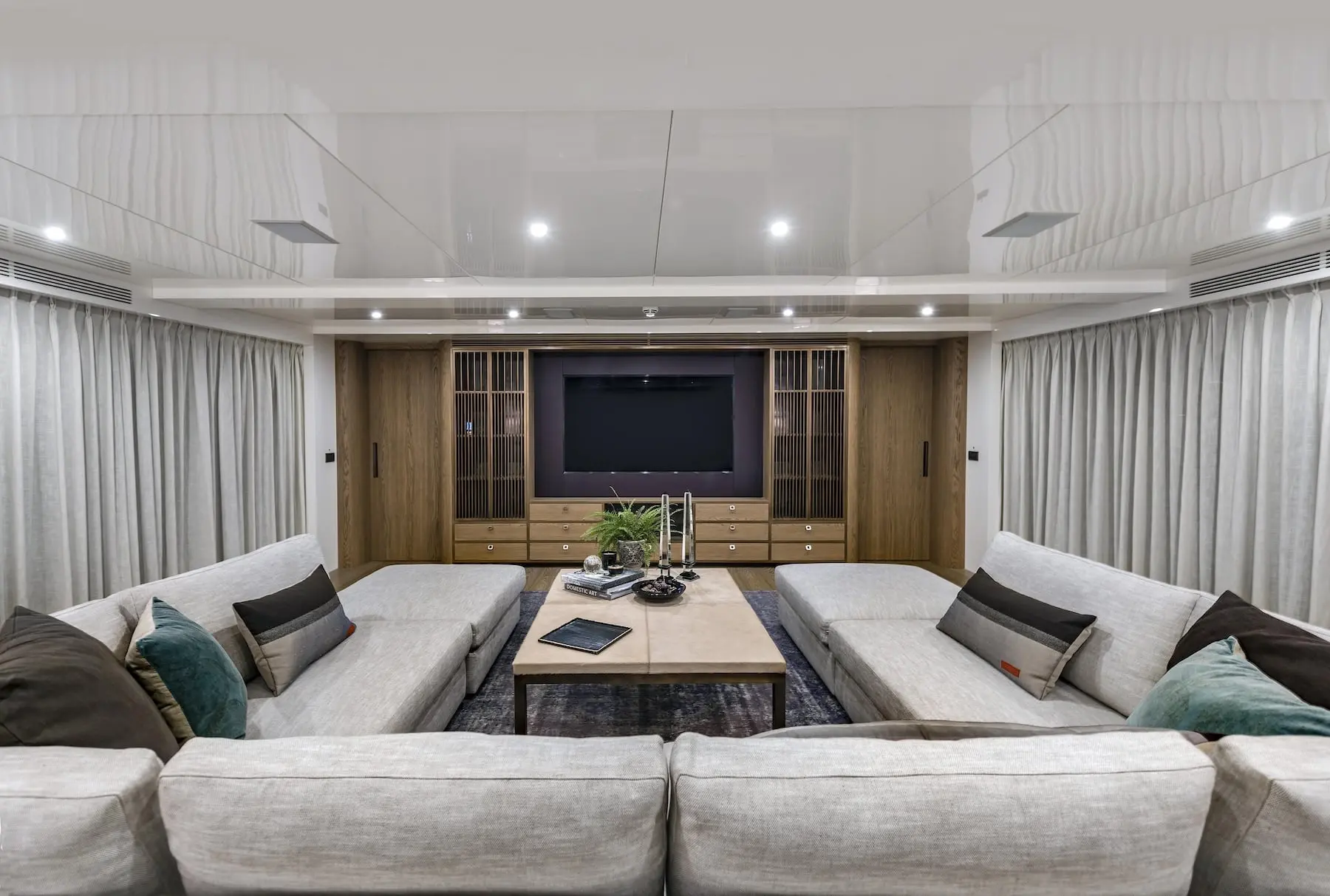 Skyfall 177 yacht cinema room with large screen and luxury sofas