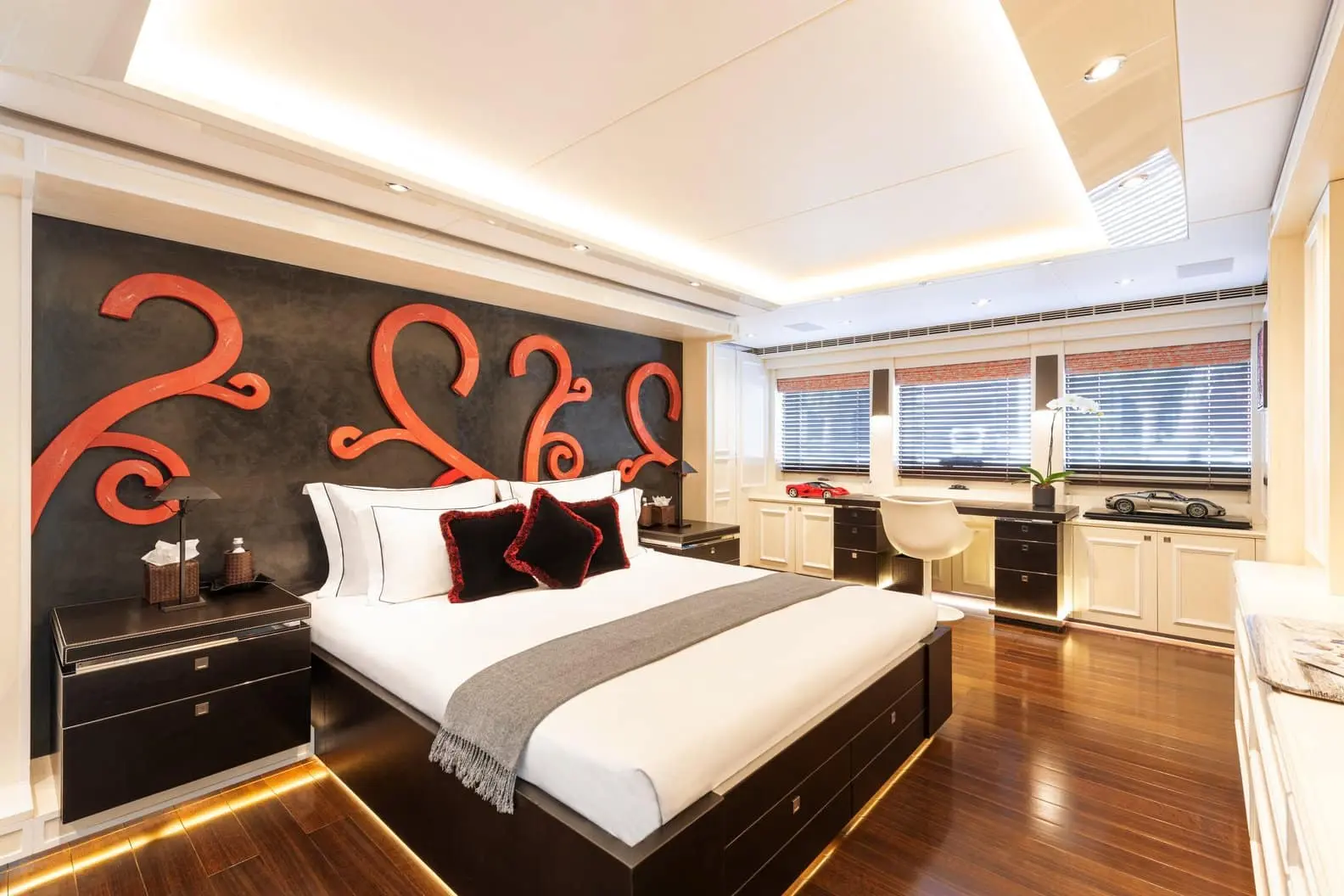 Heesen 5000 full-beam master cabin with dark feature wall