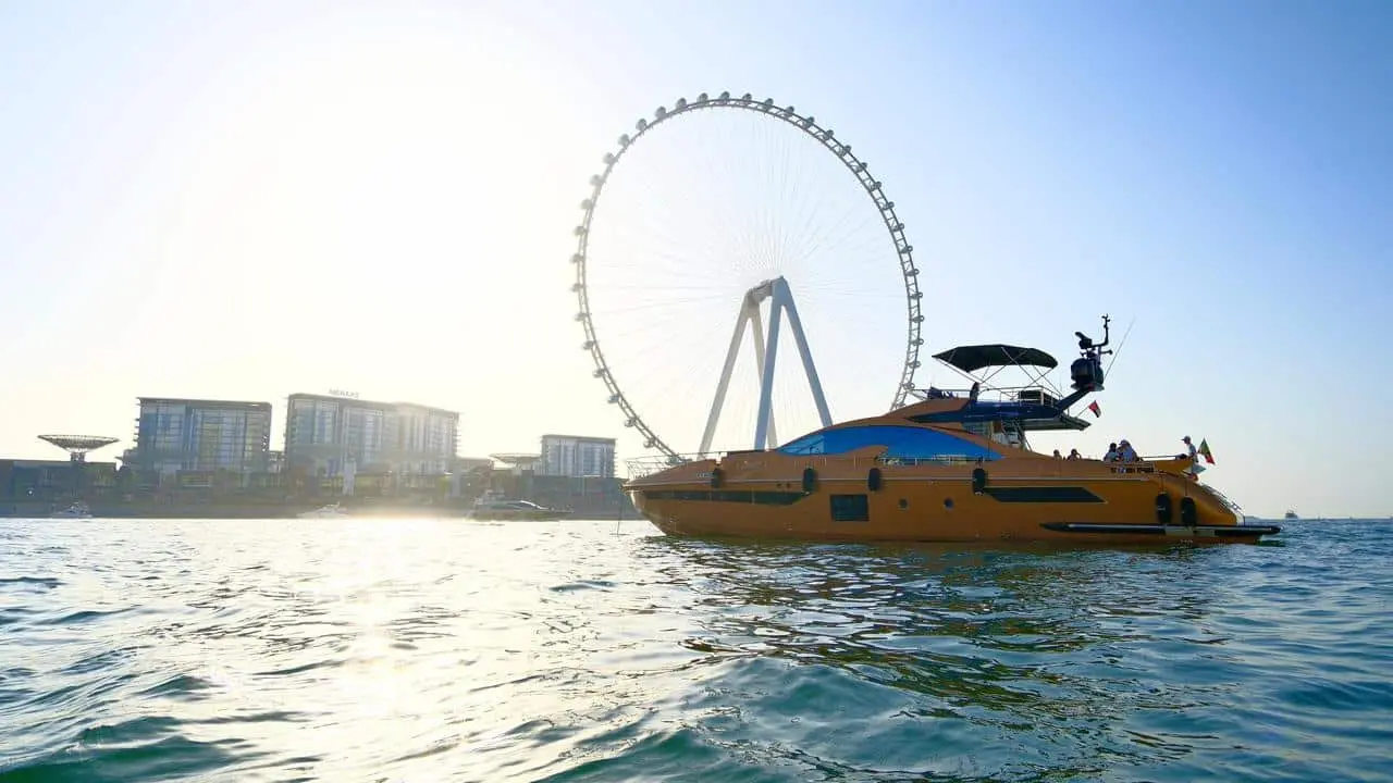 Azimut 77 yacht exterior cruising near Ain Dubai with skyline waterfront view