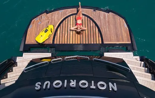 Aerial view of Notorious yacht stern deck with water toys