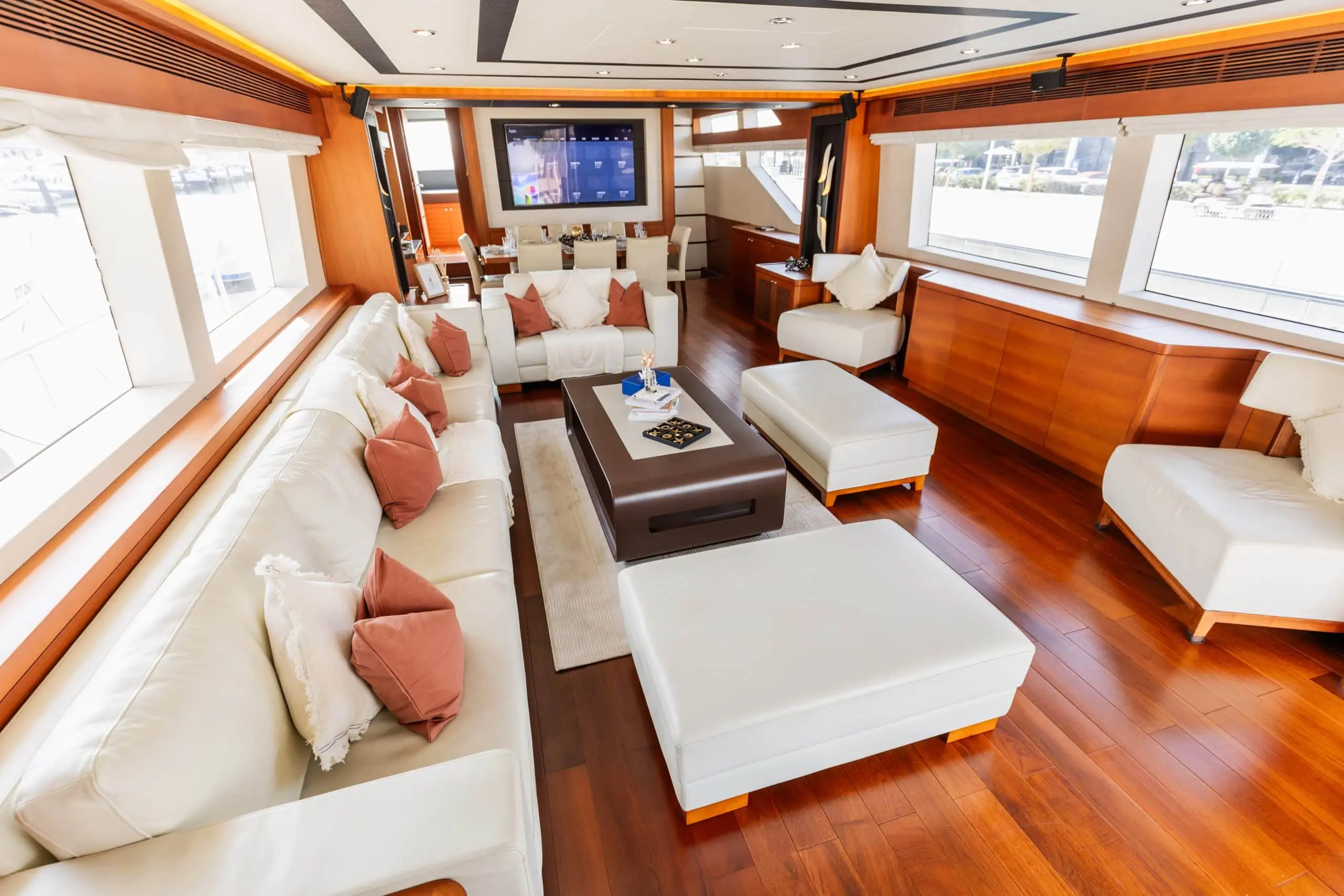 Cante 97 yacht interior lounge with white leather sofas