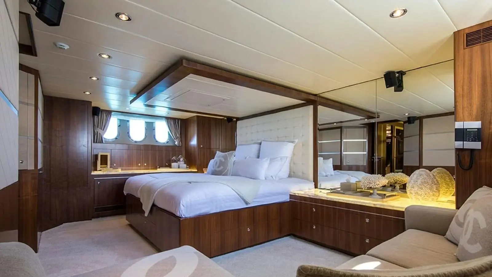 Zeta 100 yacht twin guest cabin with modern wooden finishes