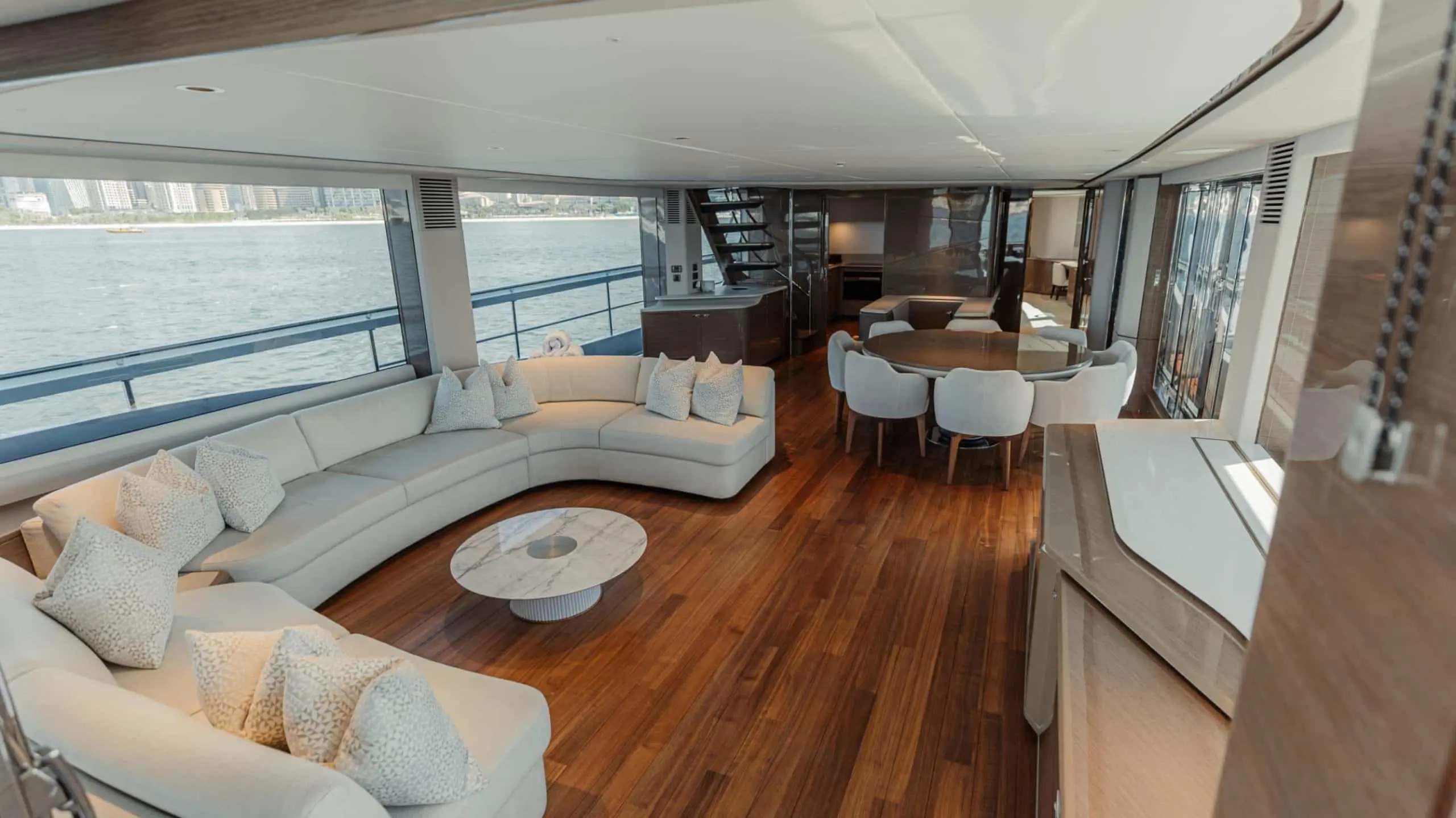 Princess X95 living area with curved lounge sofa