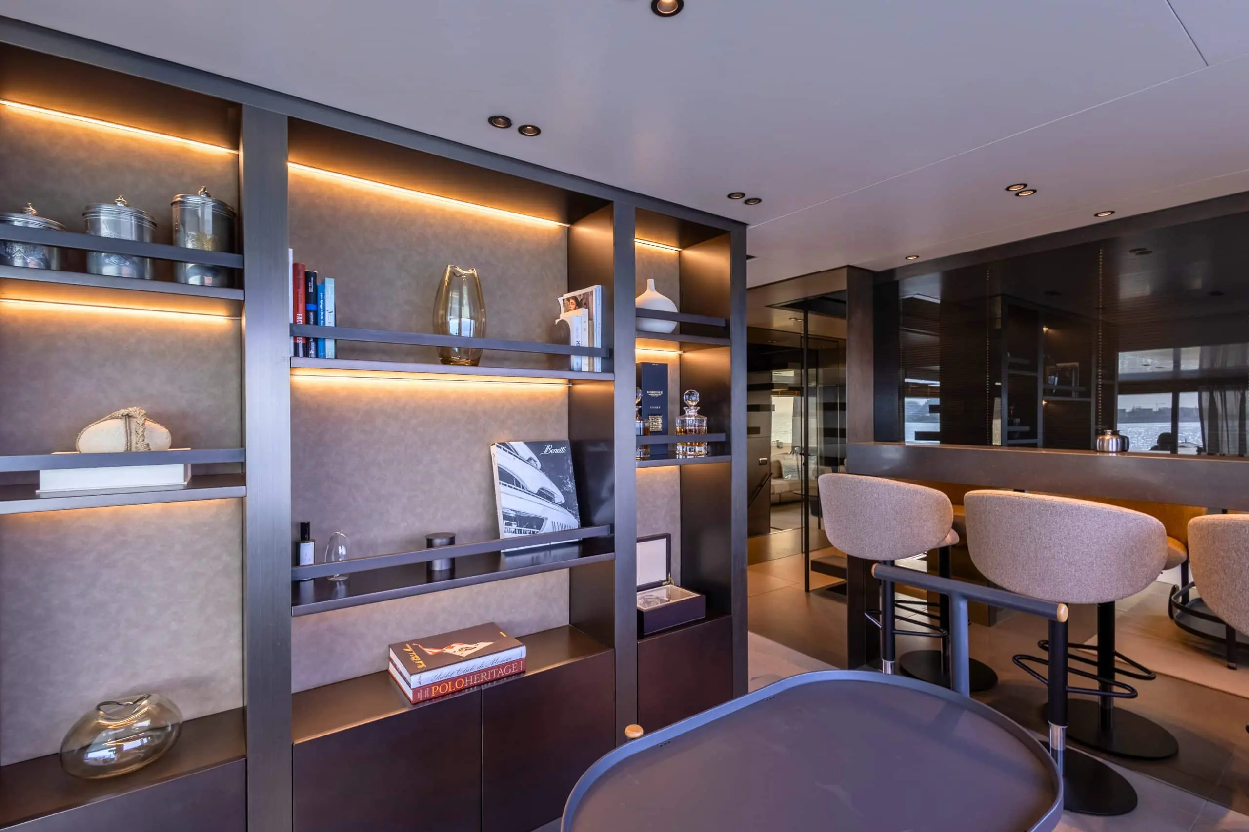 SanLorenzo SX88 saloon bar with backlit shelving and stools