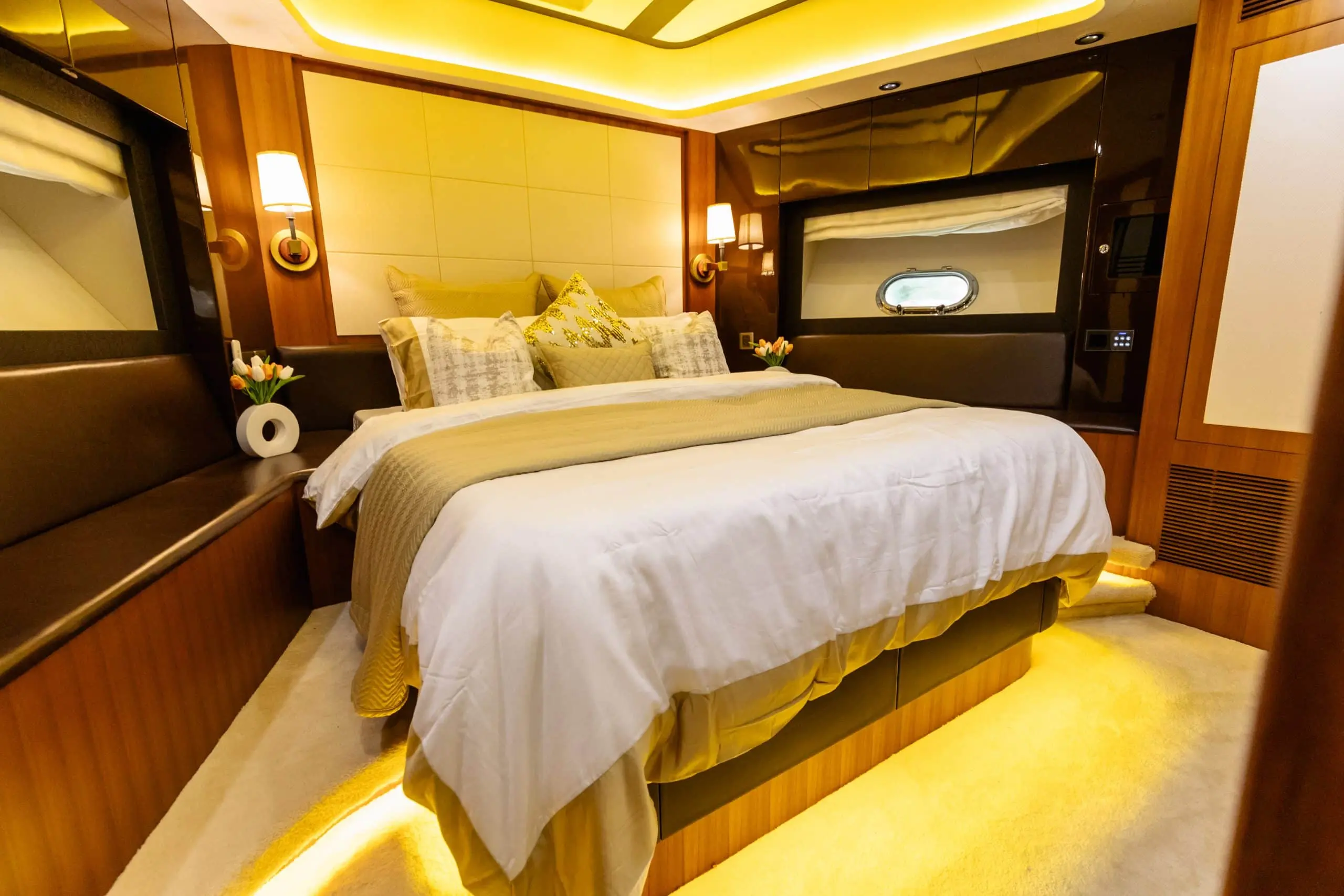 Cante 97 yacht master bedroom with king size bed and ambient lighting