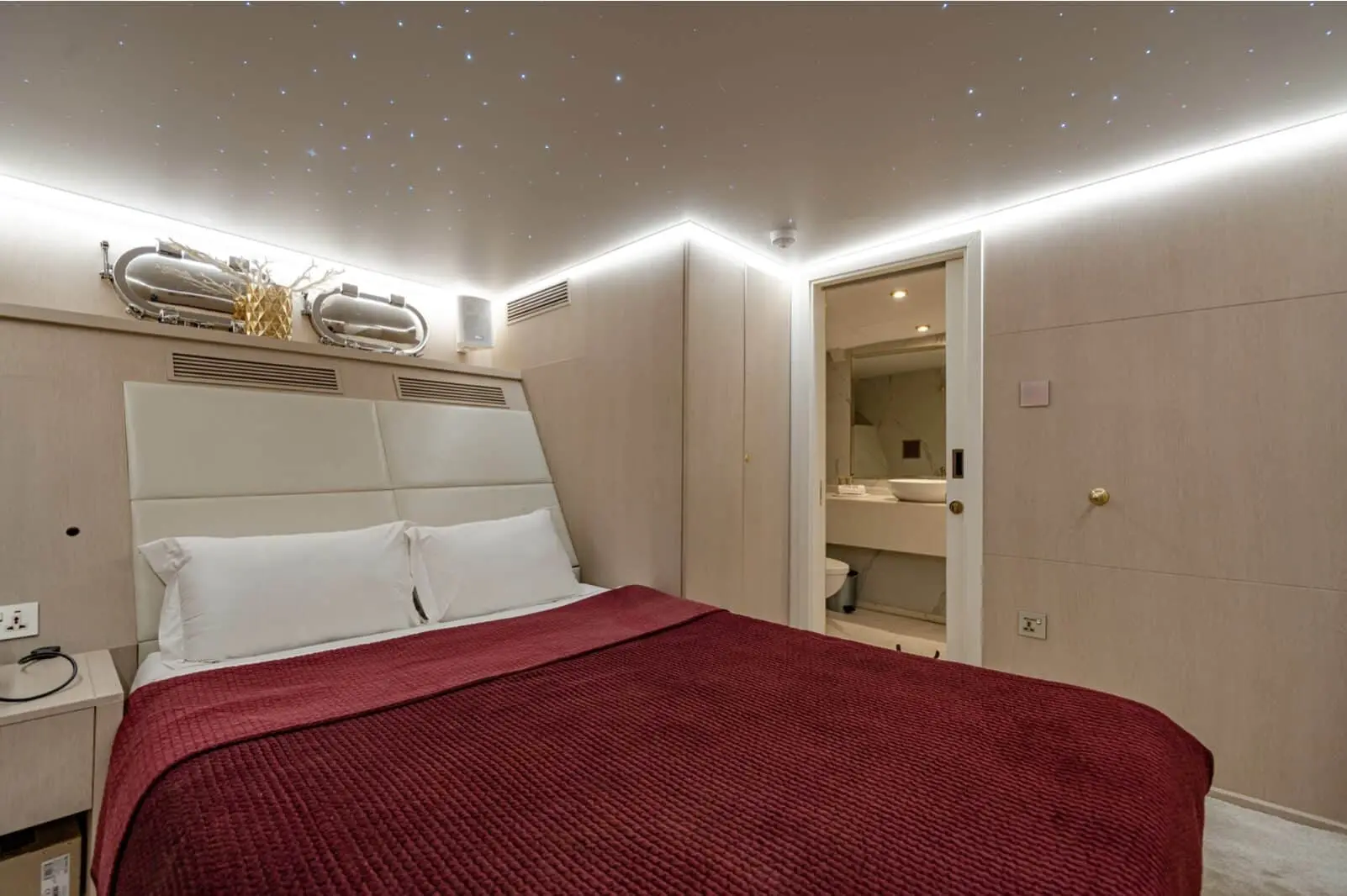 VIP guest cabin with double bed on Finesse luxury yacht in Dubai