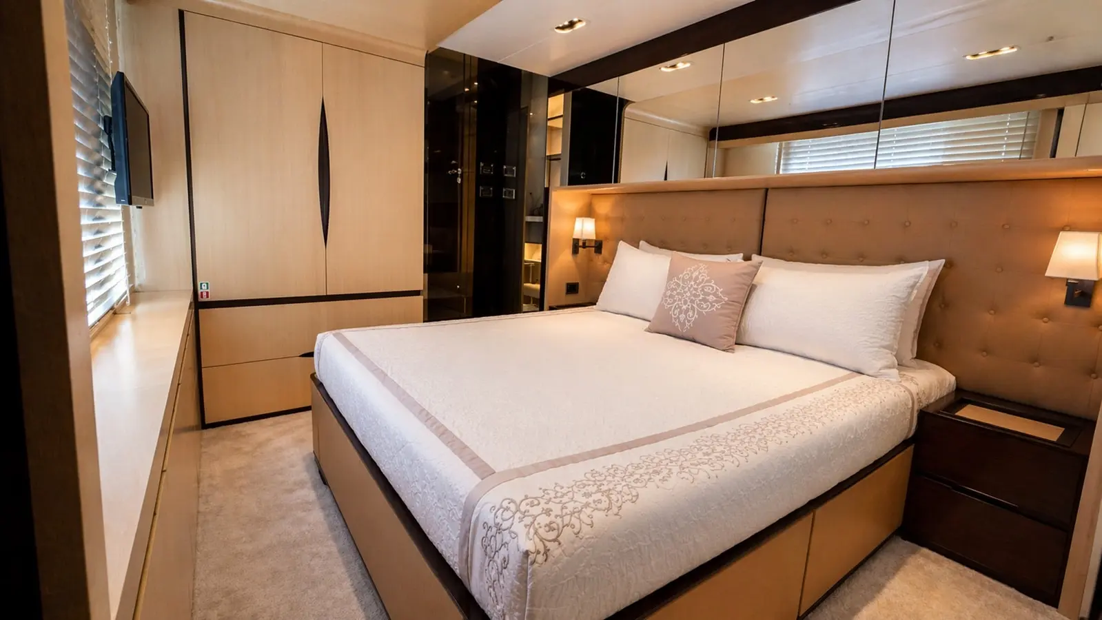 Azimut 88 guest double cabin with mirrored wardrobe panels
