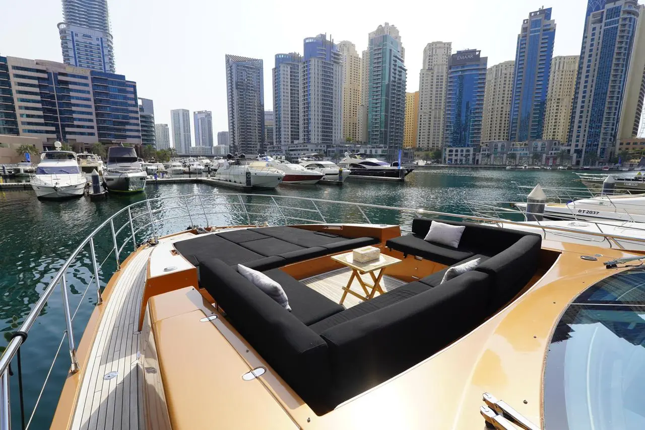 Azimut 77 yacht front lounge area overlooking Dubai Marina skyline