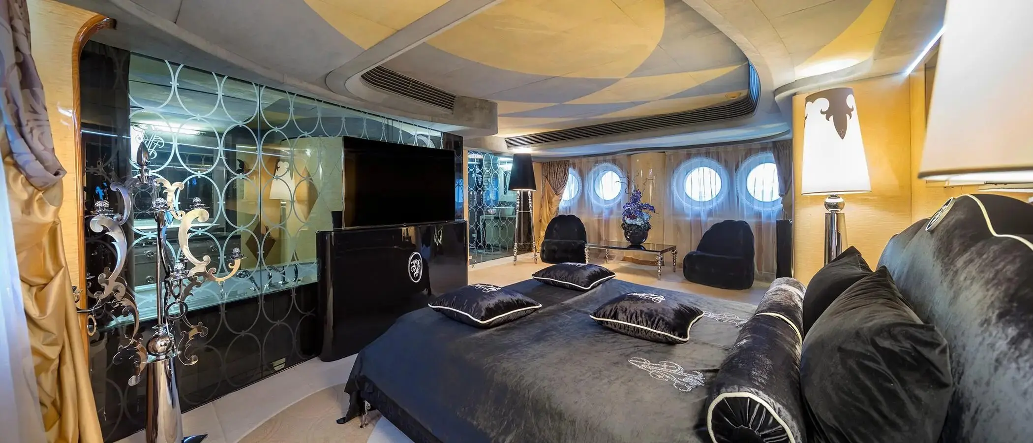 Thunder Superyacht luxury bedroom with panoramic windows and elegant design