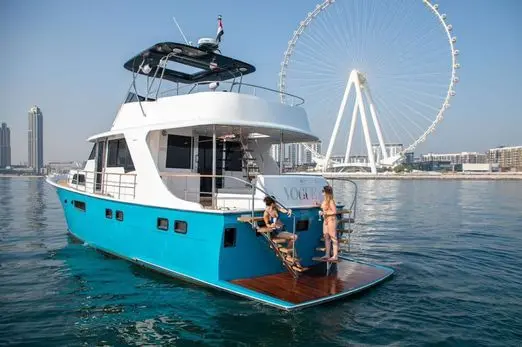 Zenith 64 yacht anchored near Dubai Marina skyline