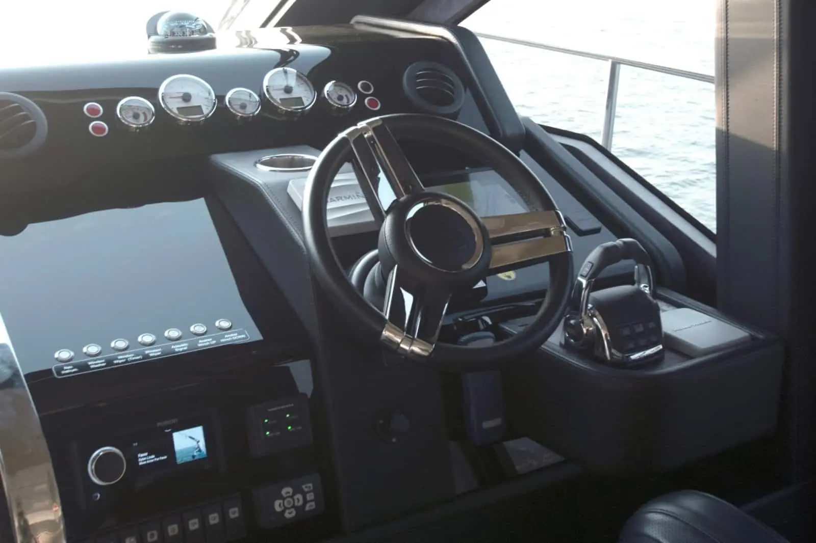 Cranchi 52 Evoluzione lower helm console with navigation screens