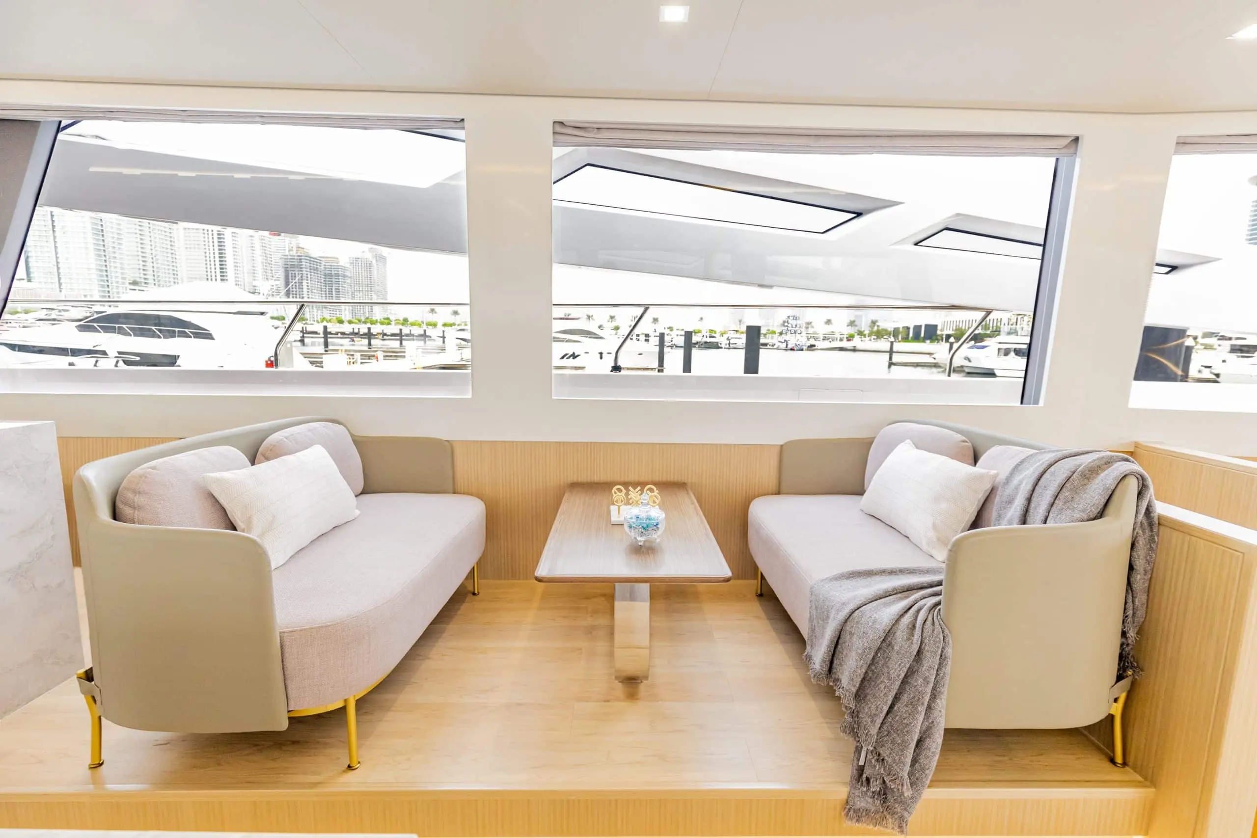 Zirve 72 luxury motor yacht seating area with contemporary armchairs and sea views