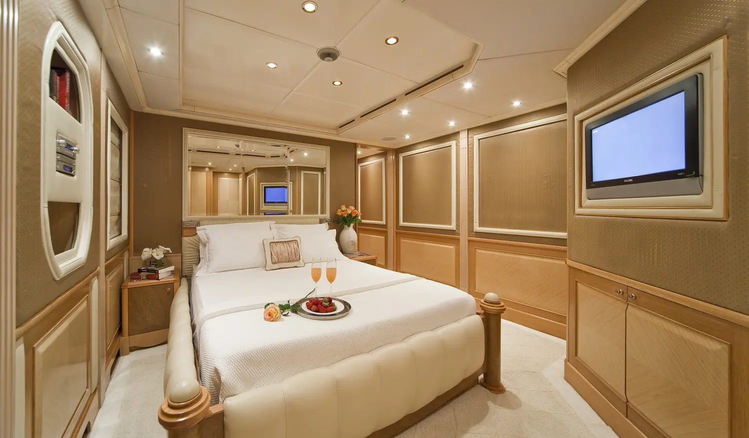 Athena 170 yacht VIP cabin with spacious layout and warm lighting