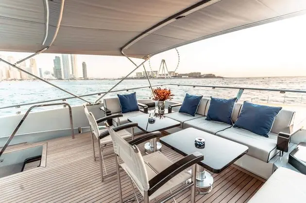 Baglietto 105 HT aft deck seating with Ain Dubai beyond