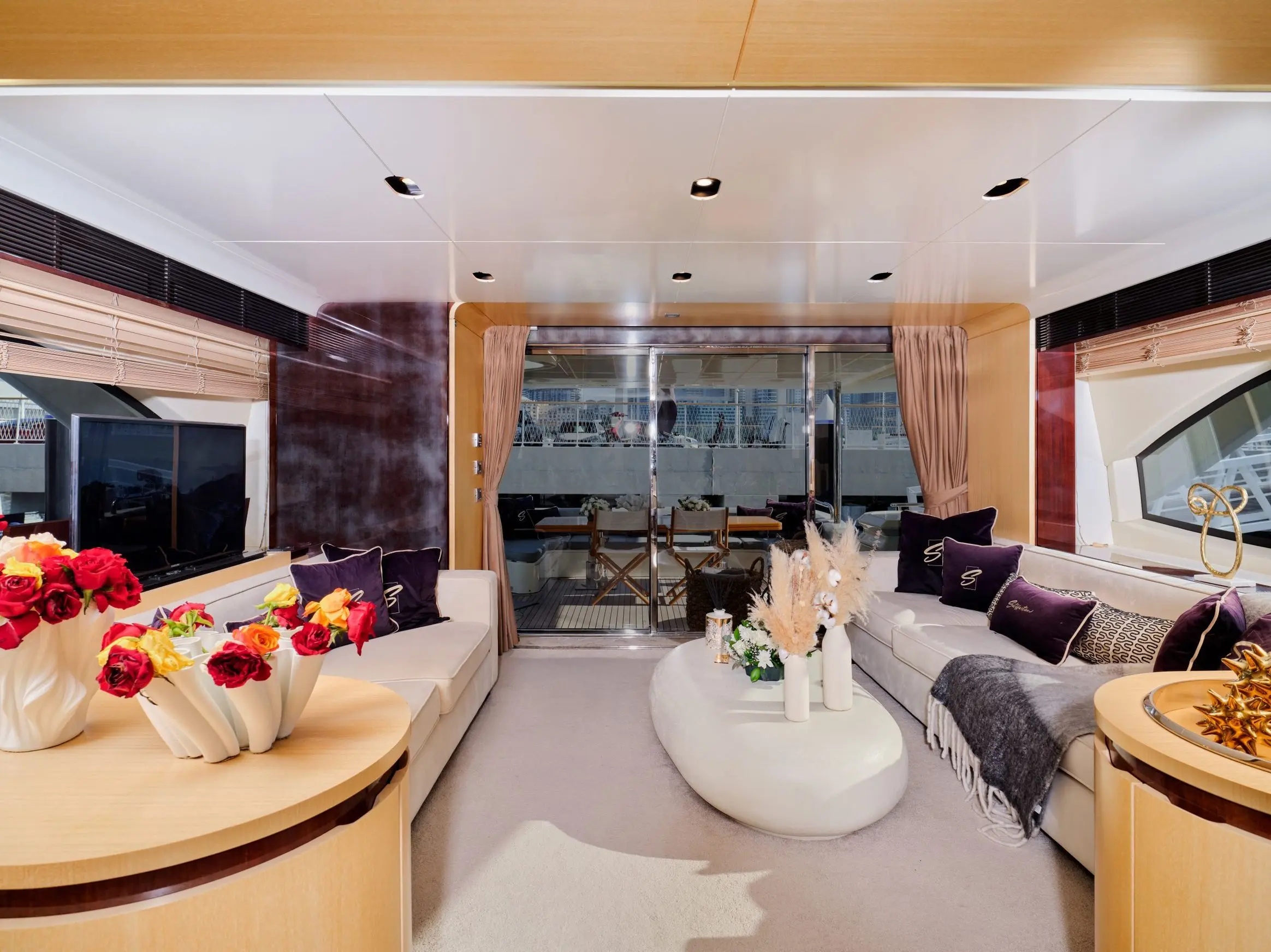 Spacious salon interior with table on Azimut 88 yacht