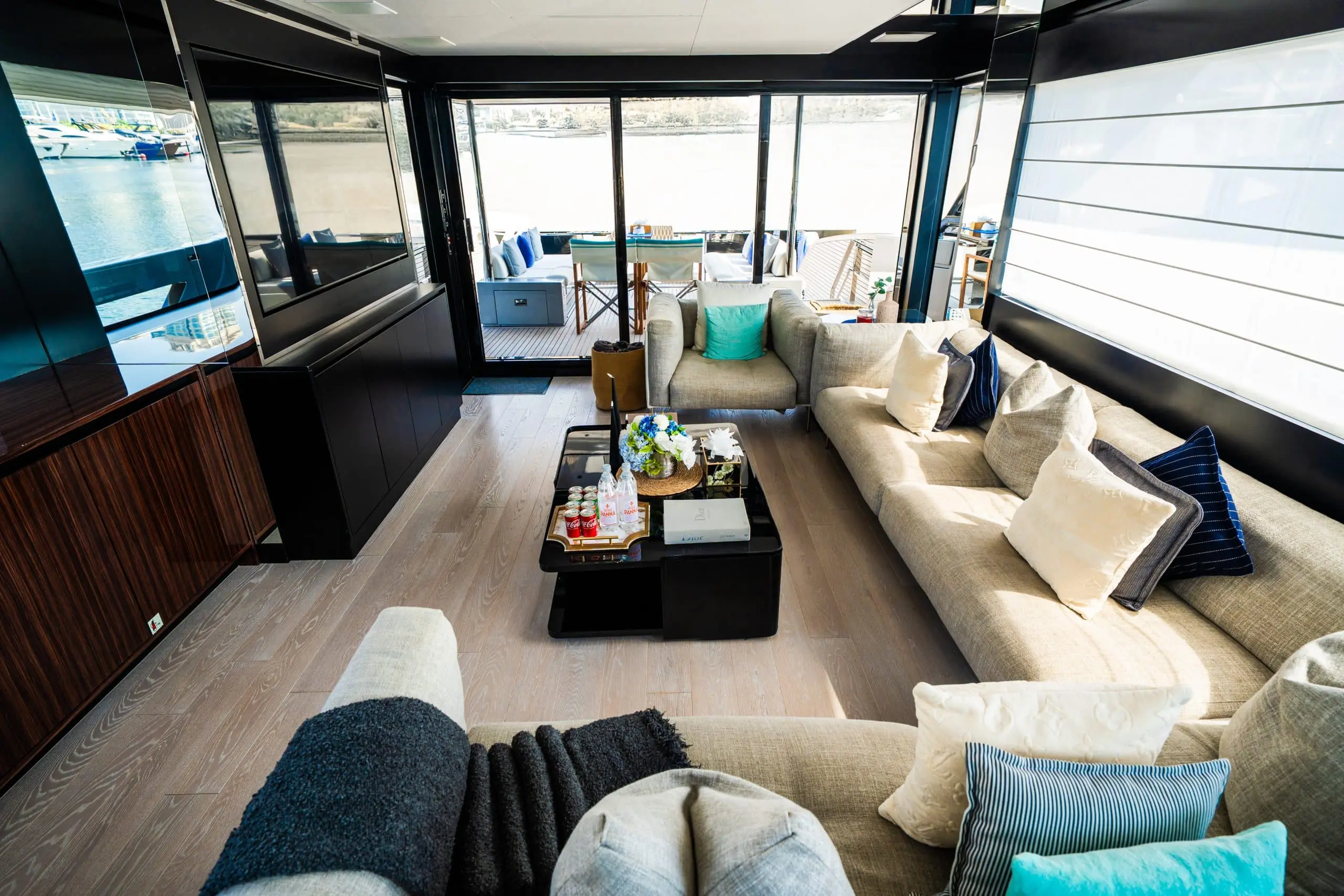 Yacht interior lounge with sofa seating, TV