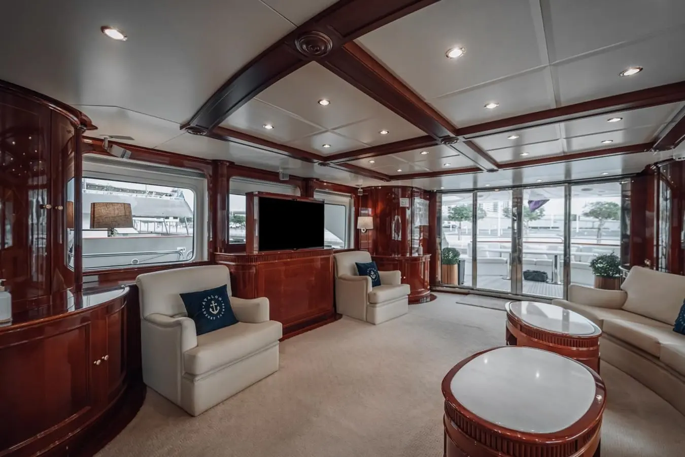 Benetti 30m main salon with mahogany joinery, broker photo