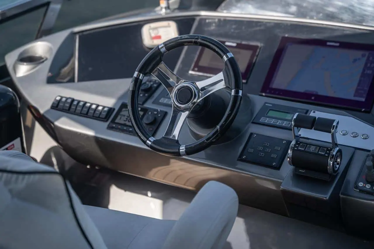 Sunseeker 82 Yacht flybridge steering wheel and navigation screens